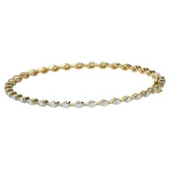 Bracciale tennis con diamanti Caroline Marquise incastonati a est-ovest in oro giallo 14K
