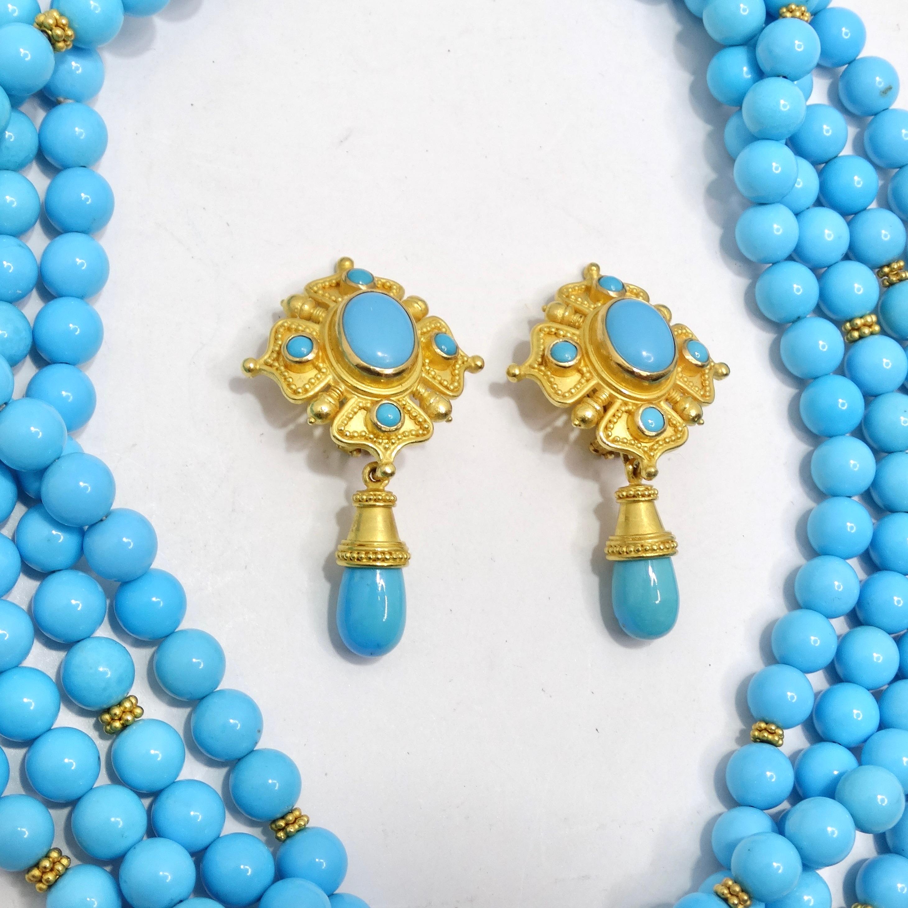 Indulge in the ultimate expression of luxury and style with the Carolyn Tyler 22K Gold Sleeping Beauty Turquoise Earrings and Necklace Set. This matching set is designed to capture hearts and make an everlasting impression. Crafted with multi