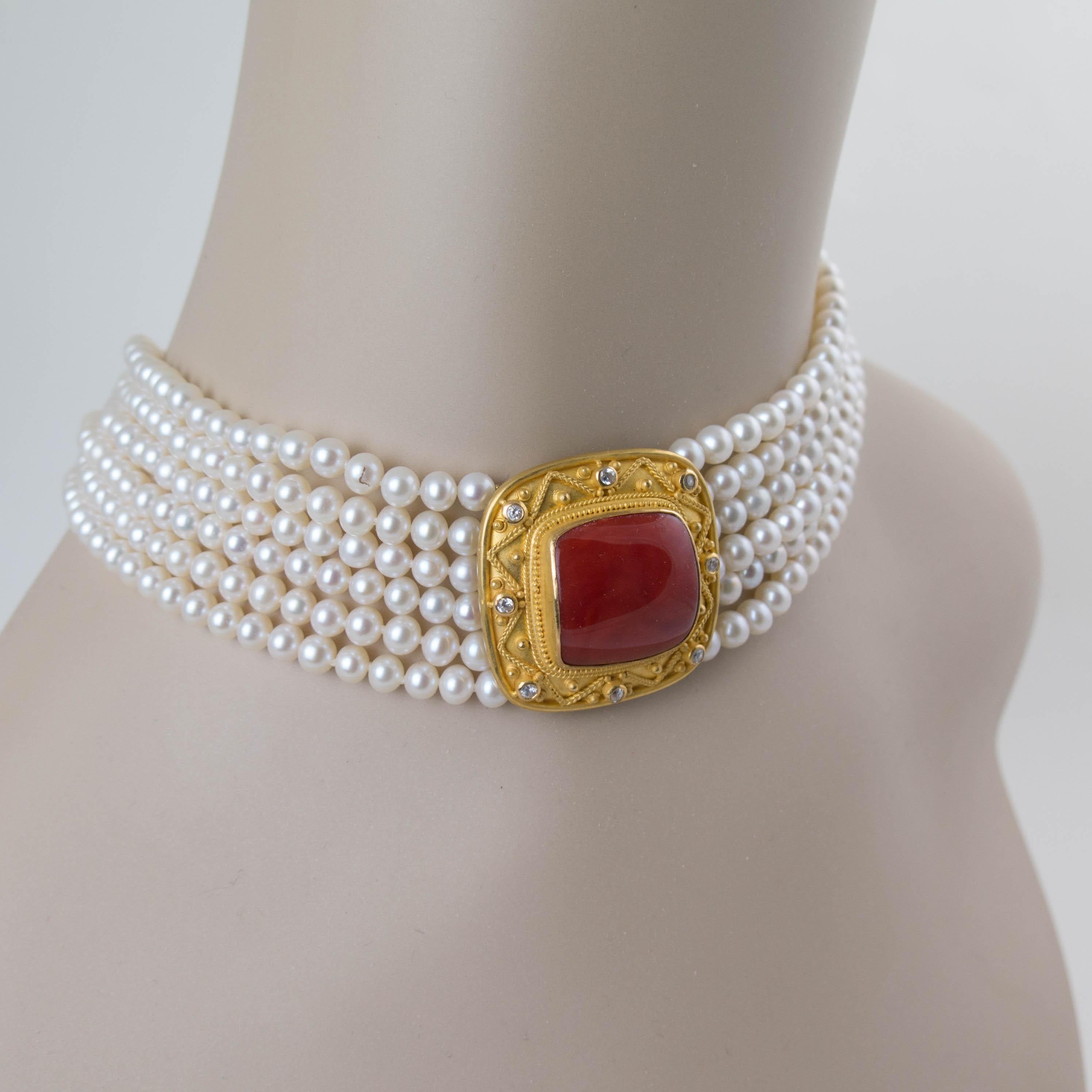 A bold pearl, coral, diamond and 22k yellow gold 