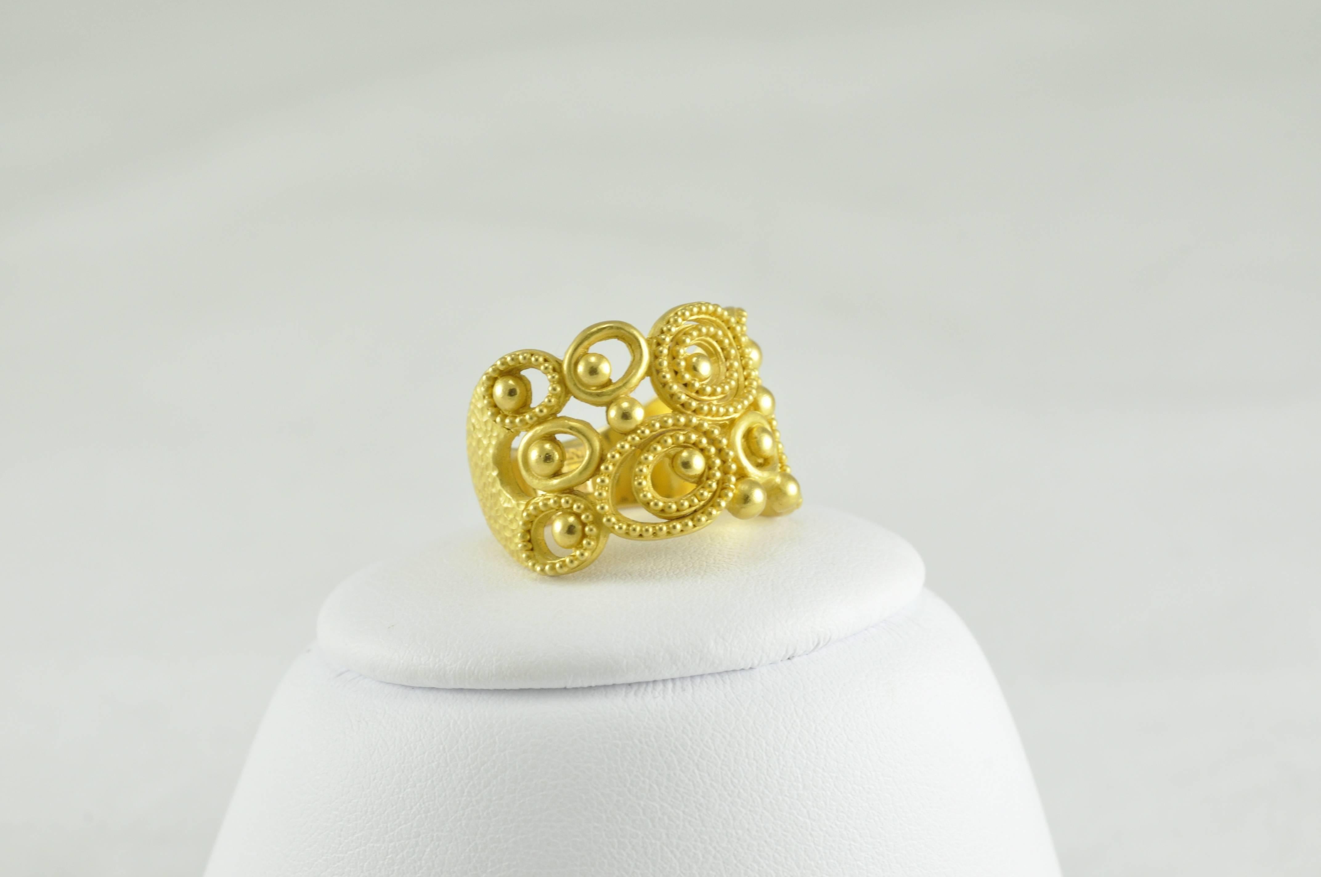 Carolyn Tyler Dune Gold Ring. 
Crafted in 22k Granulated Gold. 
Currently sized 7.5.  Addiitonal Sizes may be available upon request.  This ring cannot be sized but can be ordered in your size and takes approximately six weeks to fulfill the order.  