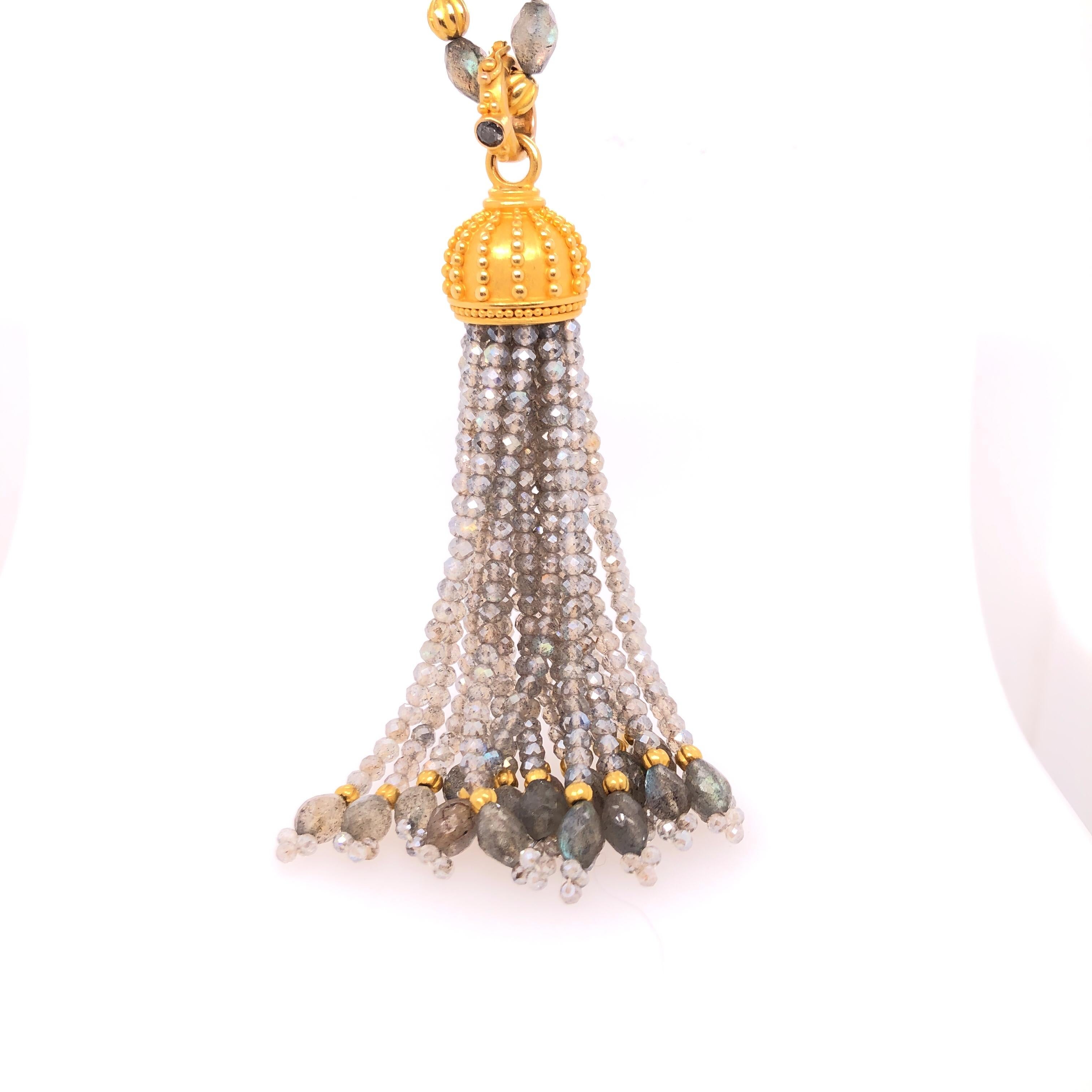 18K Yellow Gold and Laborite necklace and tassel. 

Stamped: 18K, C. Tyler, Indonesia
   