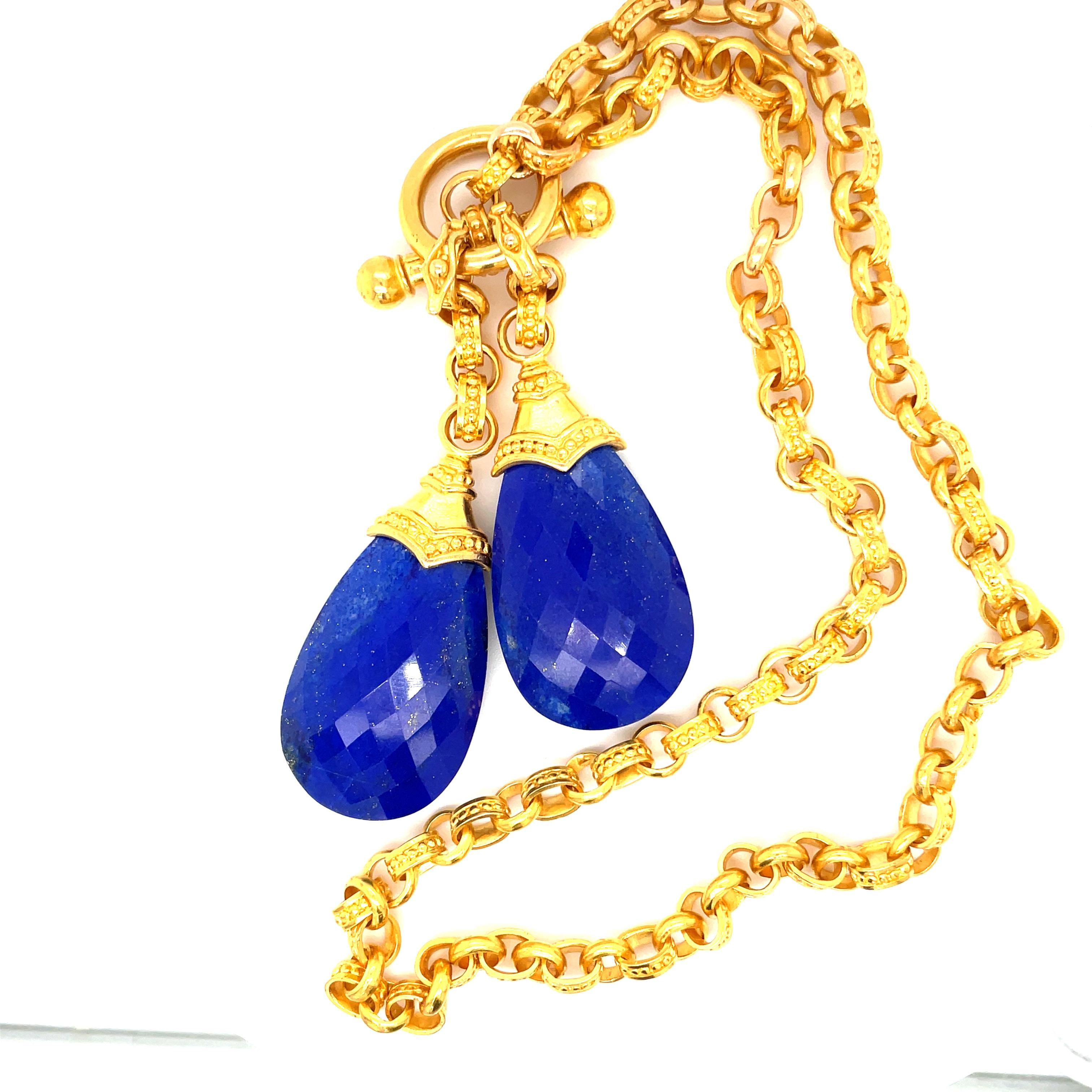 Carolyn Tyler Lapis and Gold Link Necklace.  18K Yellow Gold chain with granulation that is Carolyn's signature!  18 Inches long this necklace is a stunner and the lapis charms can be removed and chain worn alone. 
Stamped with C. Tyler, 18K,