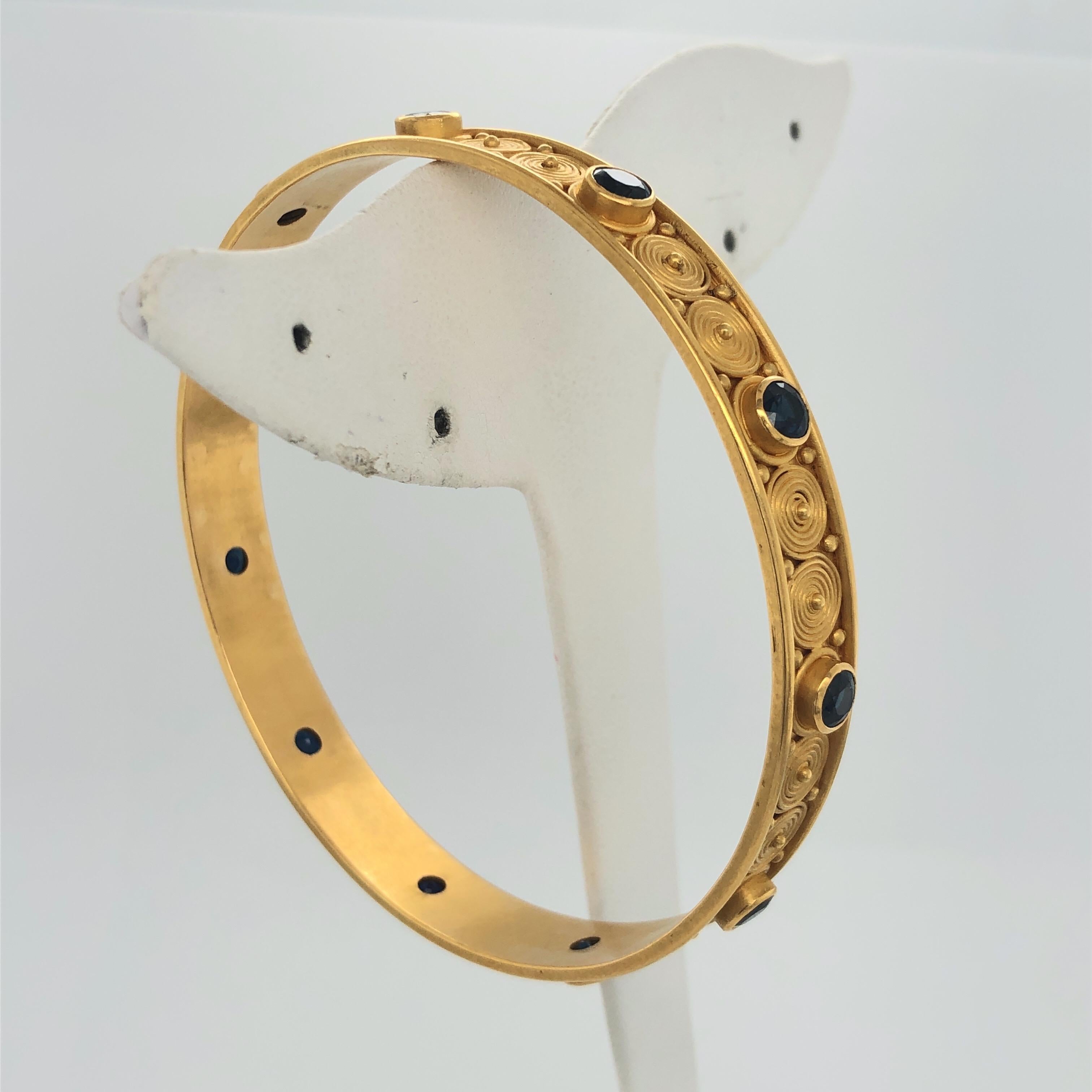 Women's Carolyn Tyler Yellow Gold and Blue Sapphire Spiral Bangle