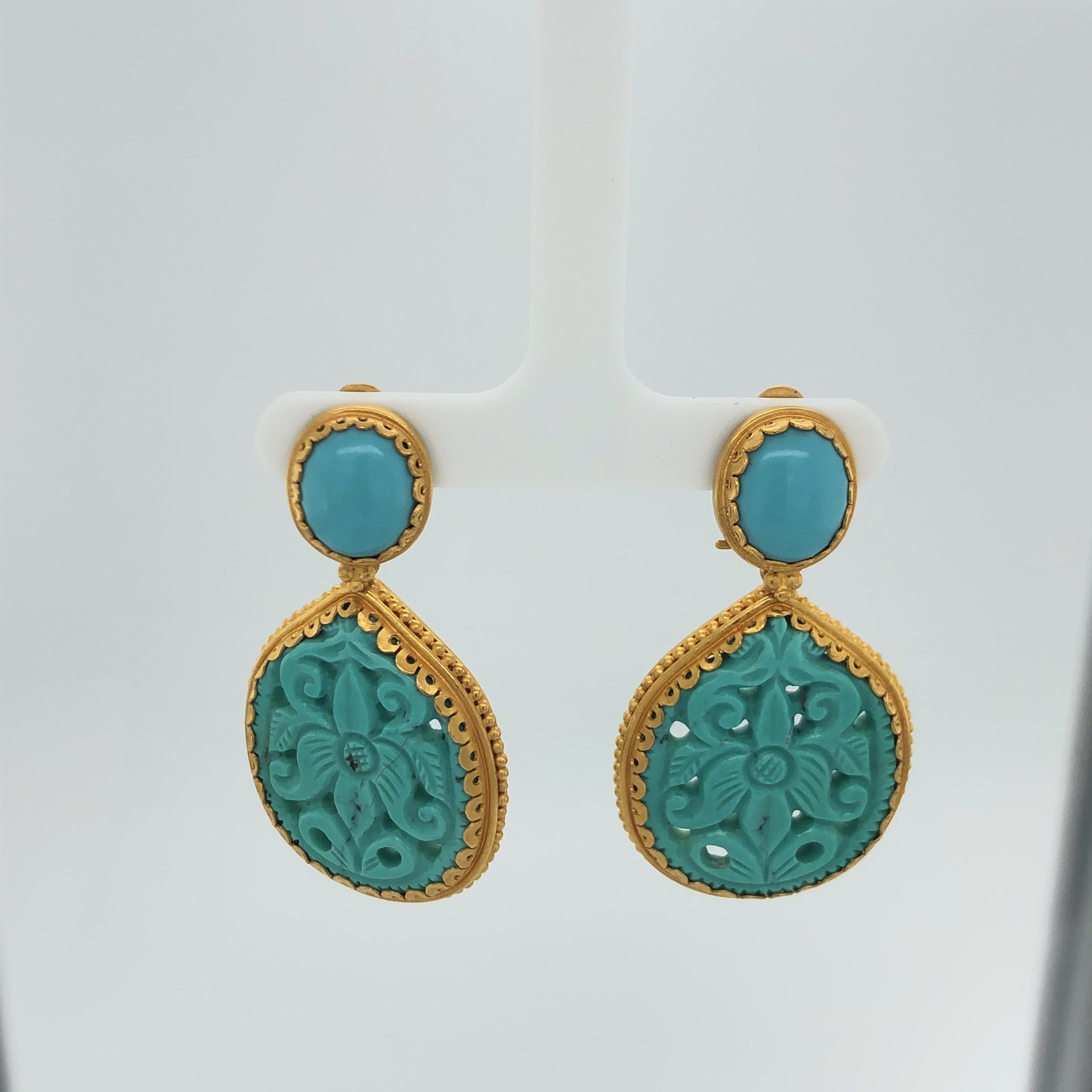 Carolyn Tyler 22K Yellow Gold 45.5 CT Carved Arizona Turquoise Earrings  These stunning earrings have a life of their own with beautiful carvings matched with the yellow gold.  The charms are removable and the posts can be worn alone or with other