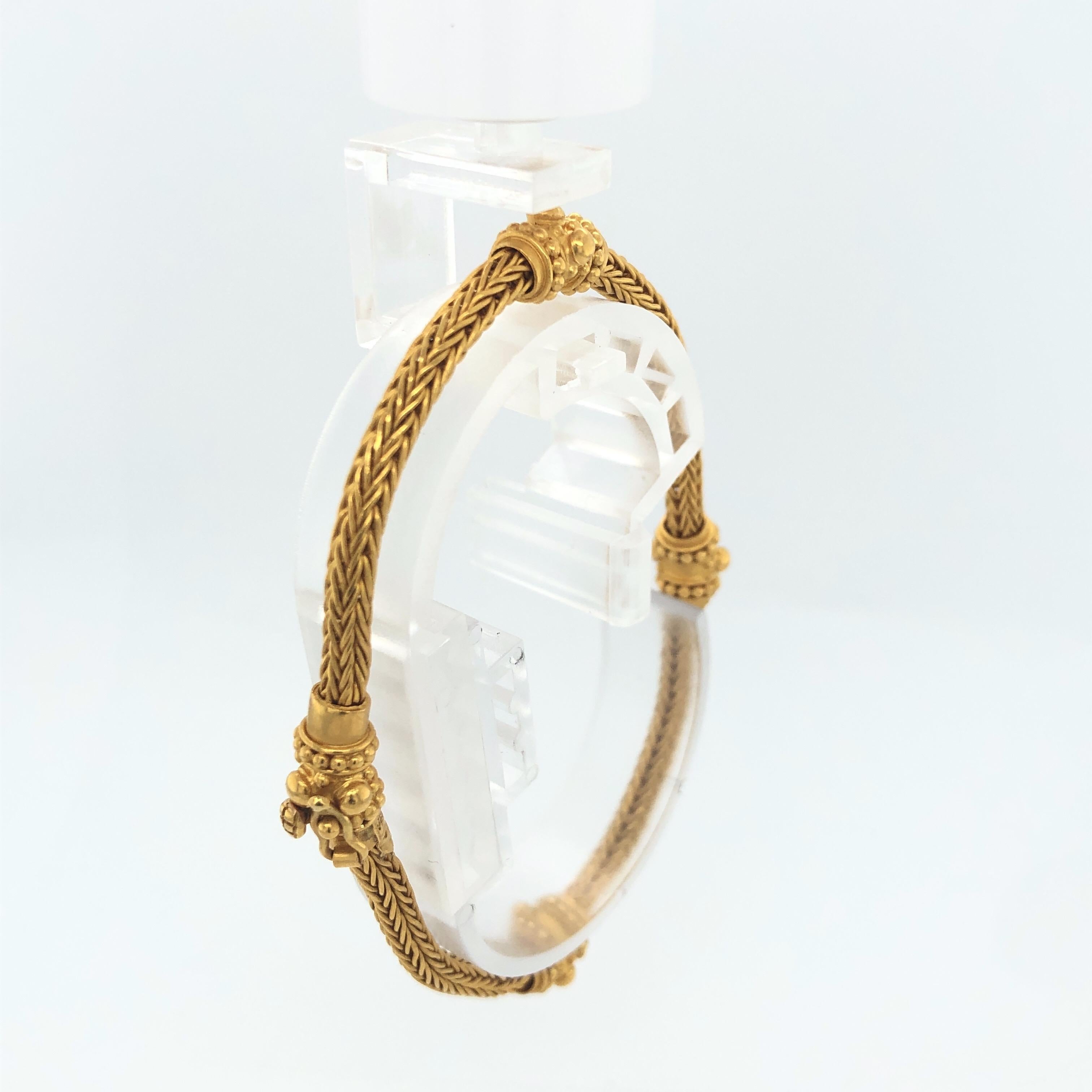 Carolyn Tyler 22K Yellow Gold Braided Etrusca Bracelet.  7.25 inches.  This soft bracelet is studded with gold stations with the intricate detailed granulation that Carolyn is so famous for.  Each piece has a beauty and resonance of it's own with