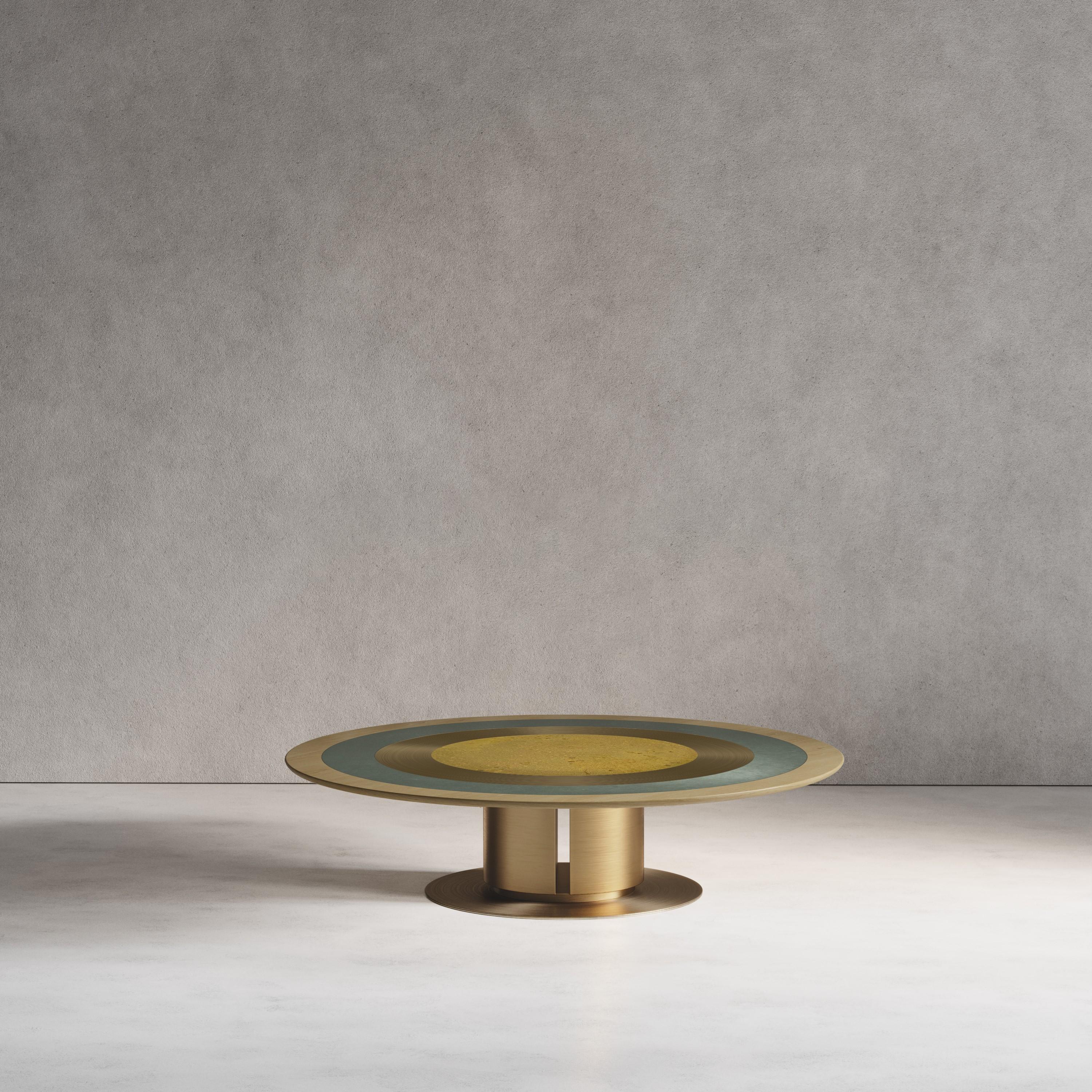 Inspired by the playfulness of a merry-go-round, the Carousel Coffee Table Aurum combines both brass, bronze, and wood. Using hand-spun brass, Solid Sycamore, Sycamore veneer, and a selection of our signature patinas, this Carousel piece plays with