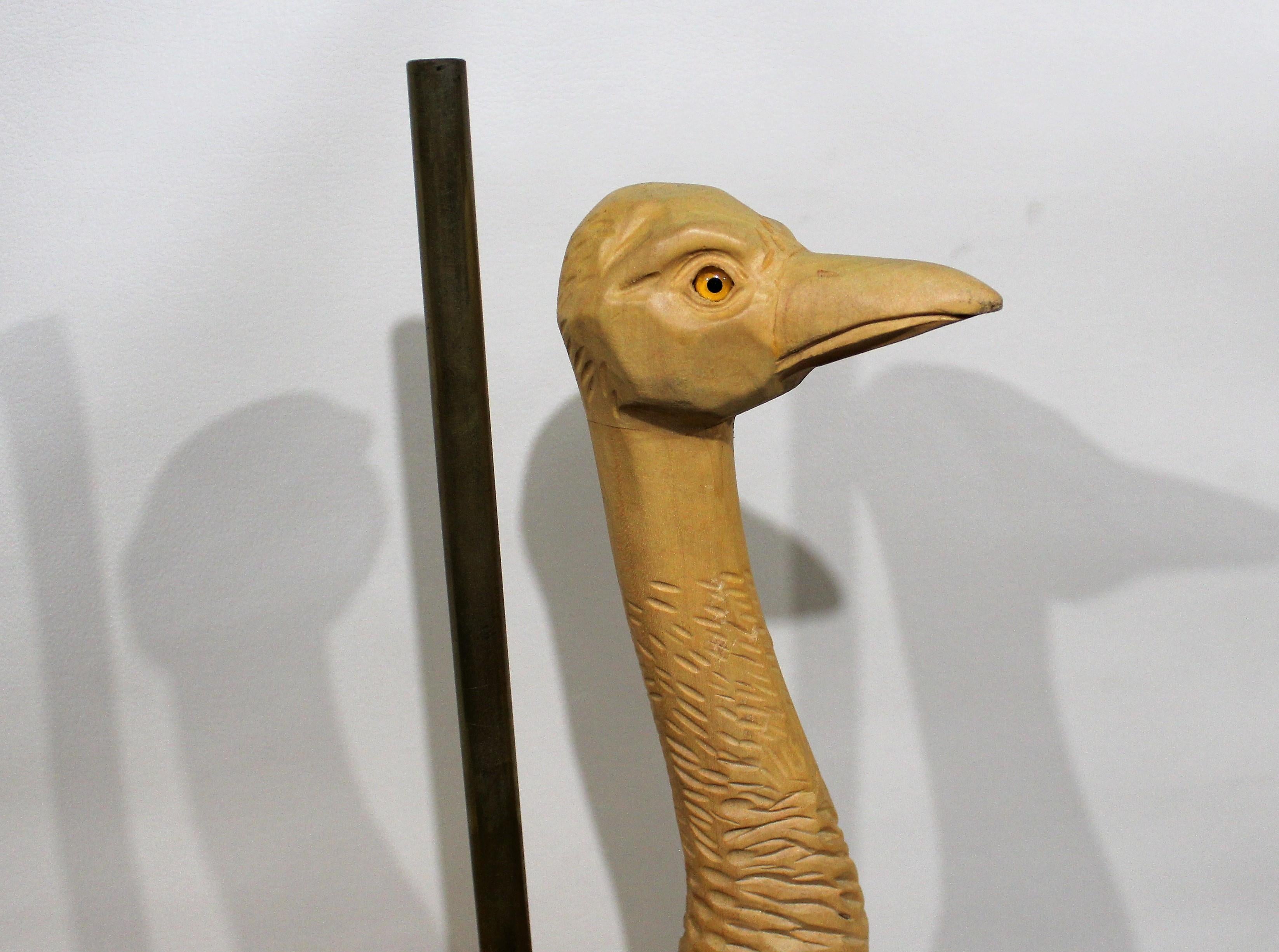 Hand carved wood sculpture of carousel ostrich.