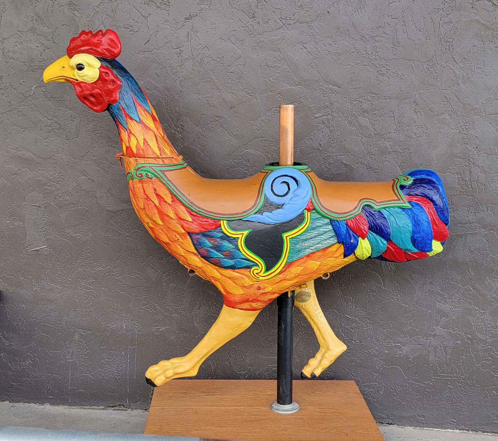 Authentic, early 1900's carved wood carousel two seated figure of a rooster. Retains brass makers label 