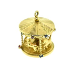 Carousel with Multi-Color Sapphires in 18 Karat Yellow Gold Charm Pendant