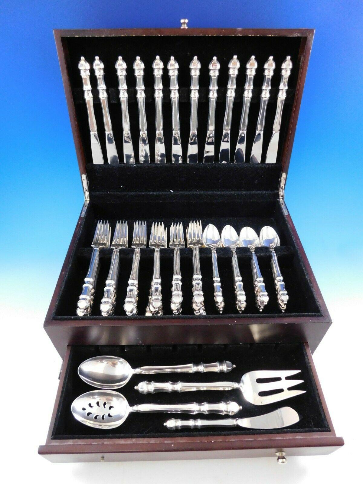 Carpenter Hall by Towle sterling silver flatware set - 52 pieces. All of the pieces in this pattern are made with hollow, shaped, sterling handles. This set includes:

12 knives, 9