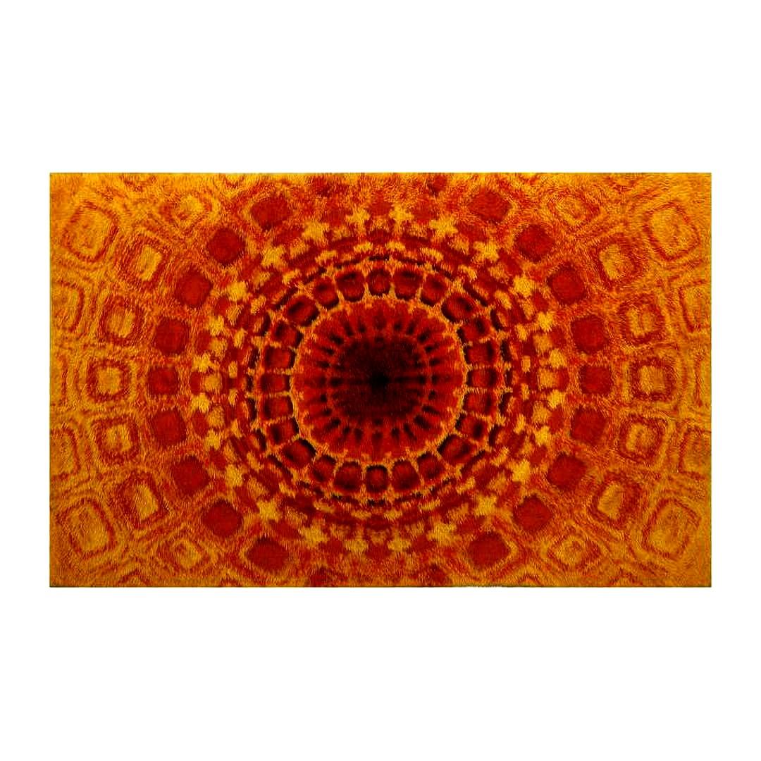 Wool carpet Panton 1960s  in bright colors red orang yellow and black. With central round design, from which the geometric design starts. Very cool and style decoration. this Carpet will take you directly to the sixties for the colors and optical