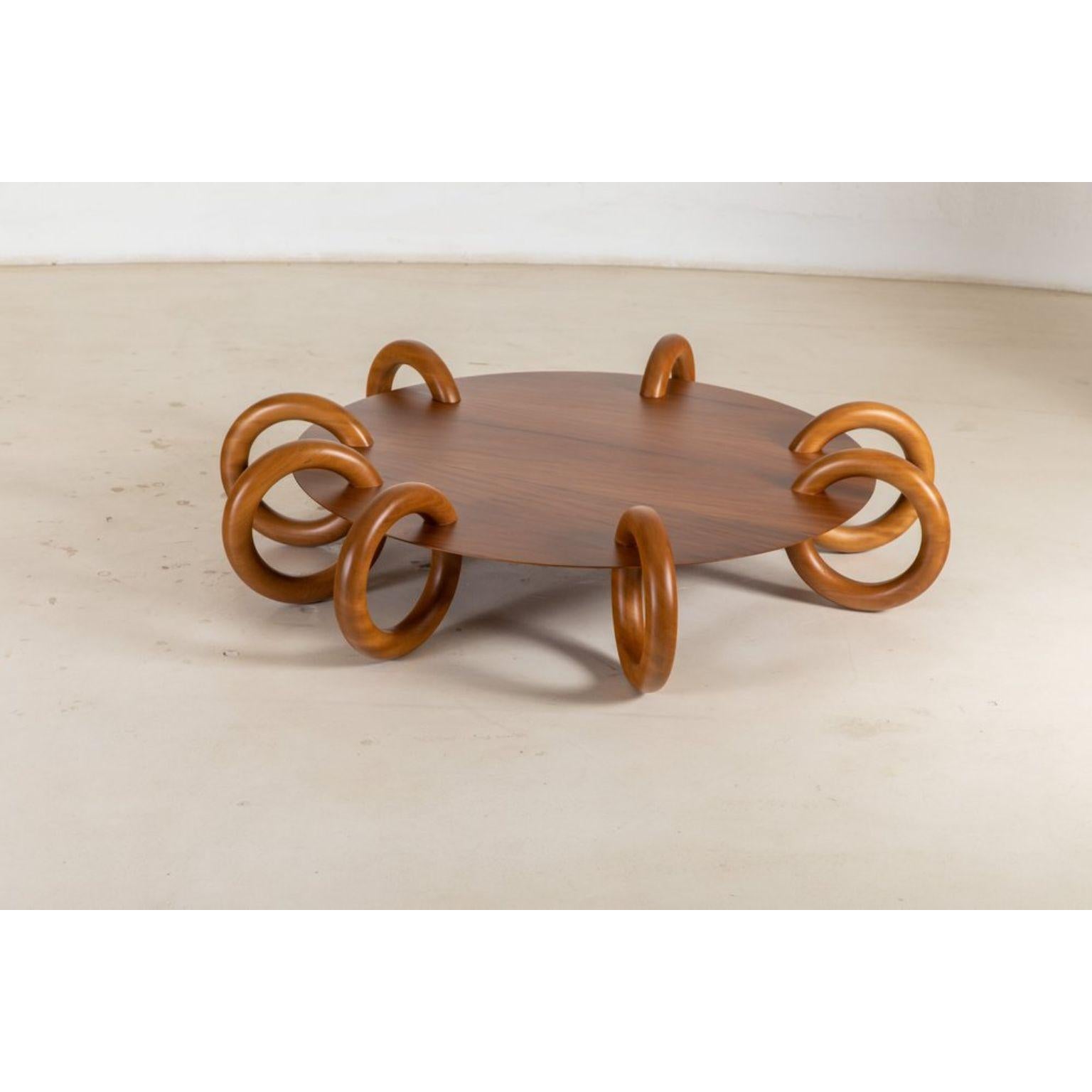 Carrapato Coffee Table by Alva Design
Dimensions: Ø 140 x H 31 cm.
Materials: MDF and solid wood (Peroba Mica).

One counter stool, one screen, one coffee table, two wall sconces, sculptures: furniture and objects that make up a Decollection