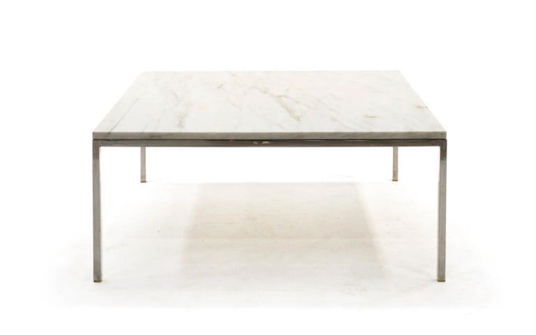 36 inch square Carrara marble and chrome coffee table in the style of Florence Knoll. White marble with gray and beige veining. No chips or significant scratches. The chrome is free of pitting and in very good condition. Ready to use.