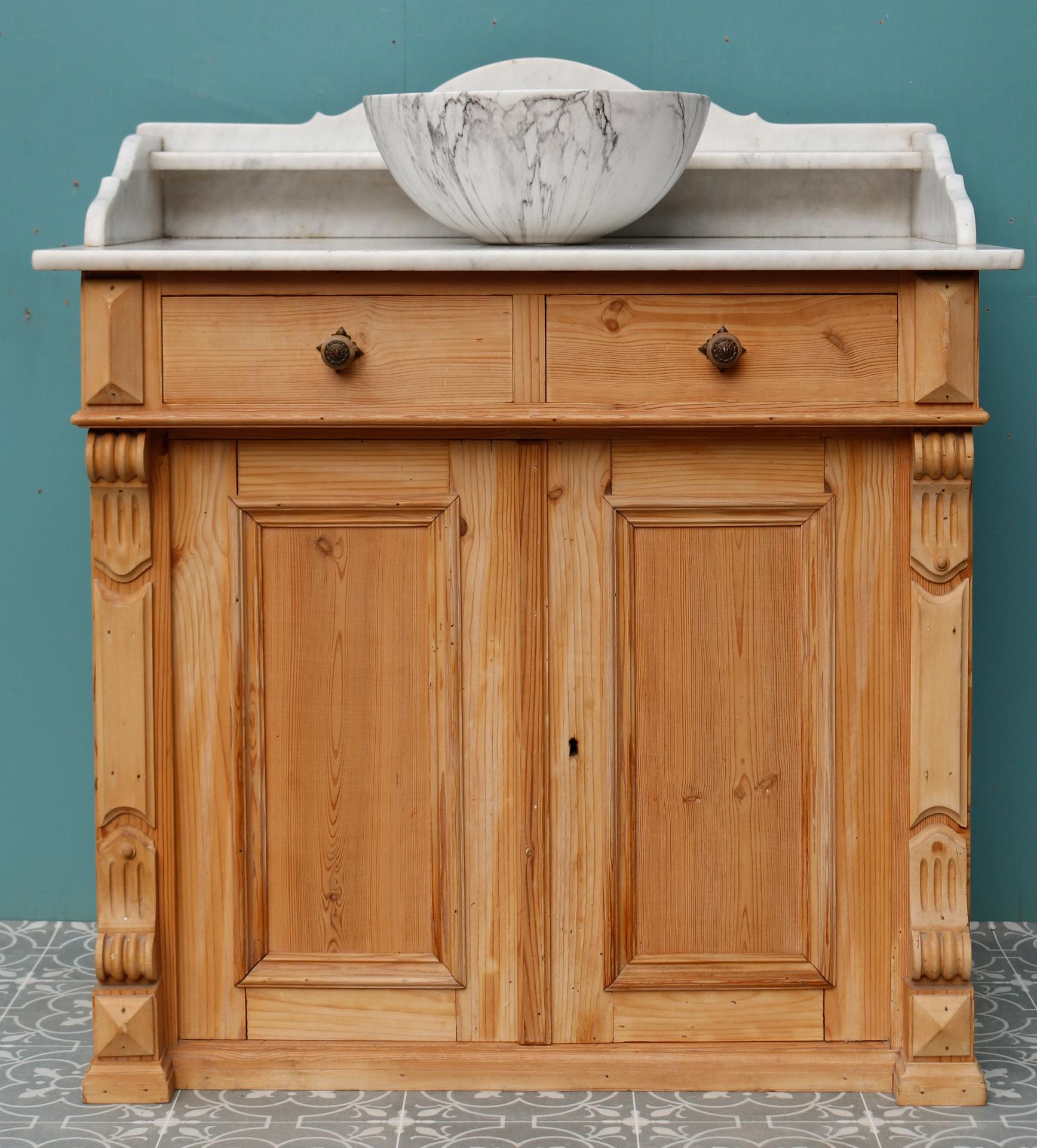 An antique Victorian style washstand constructed from pine with a Carrara marble top and splashback. Supplied with an antique style porcelain bowl.
 
Additional Dimensions:
 
Bowl external diameter 32.5 cm
 
Counter  height 75 cm