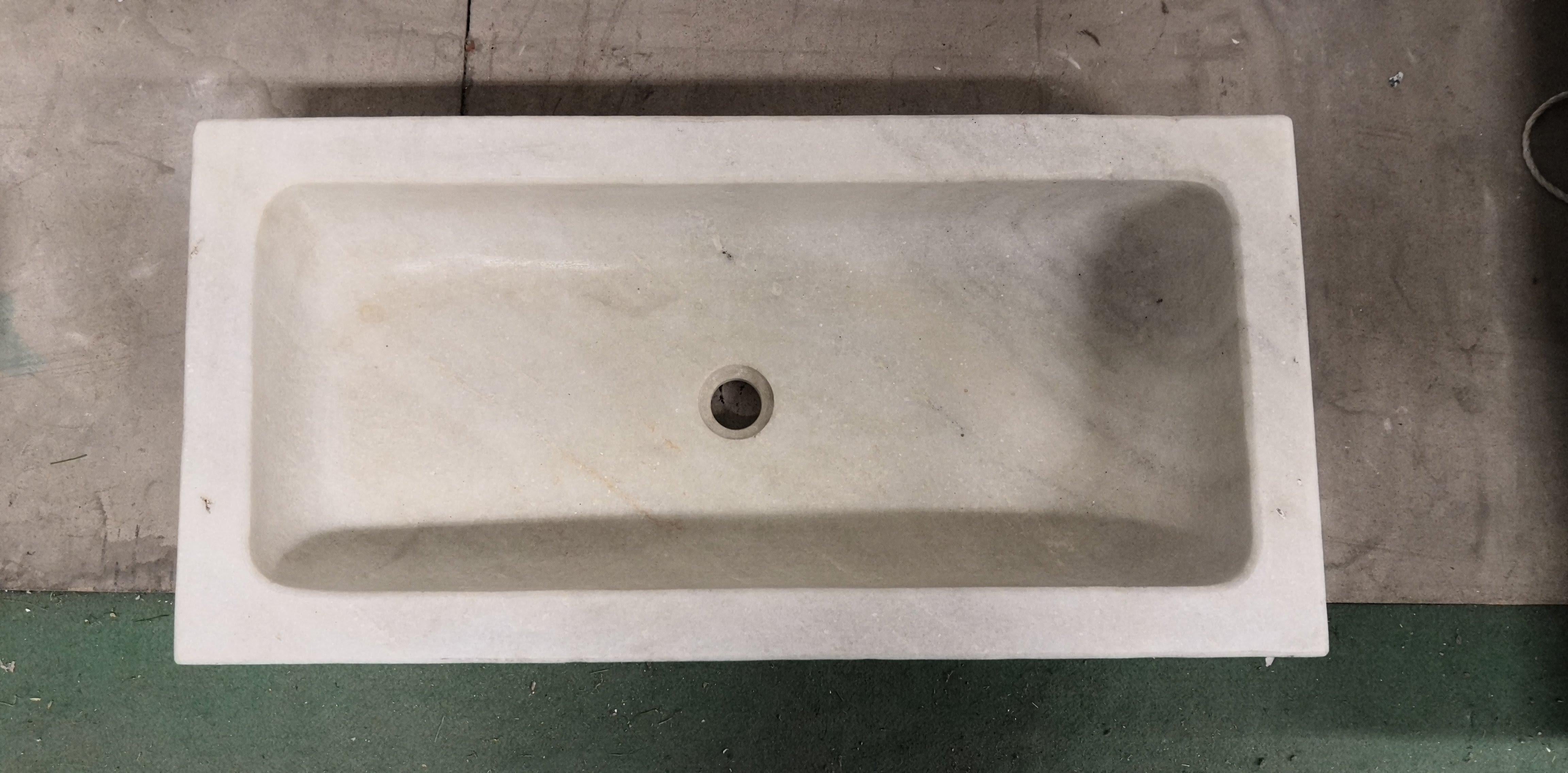 A simple natural design ideal for kitchen or bathroom for old and new buildings,
superb warm veined character, cut from one piece of carrara marble.
Sink manufactured in Carrara Marble, custom sizing available.
 