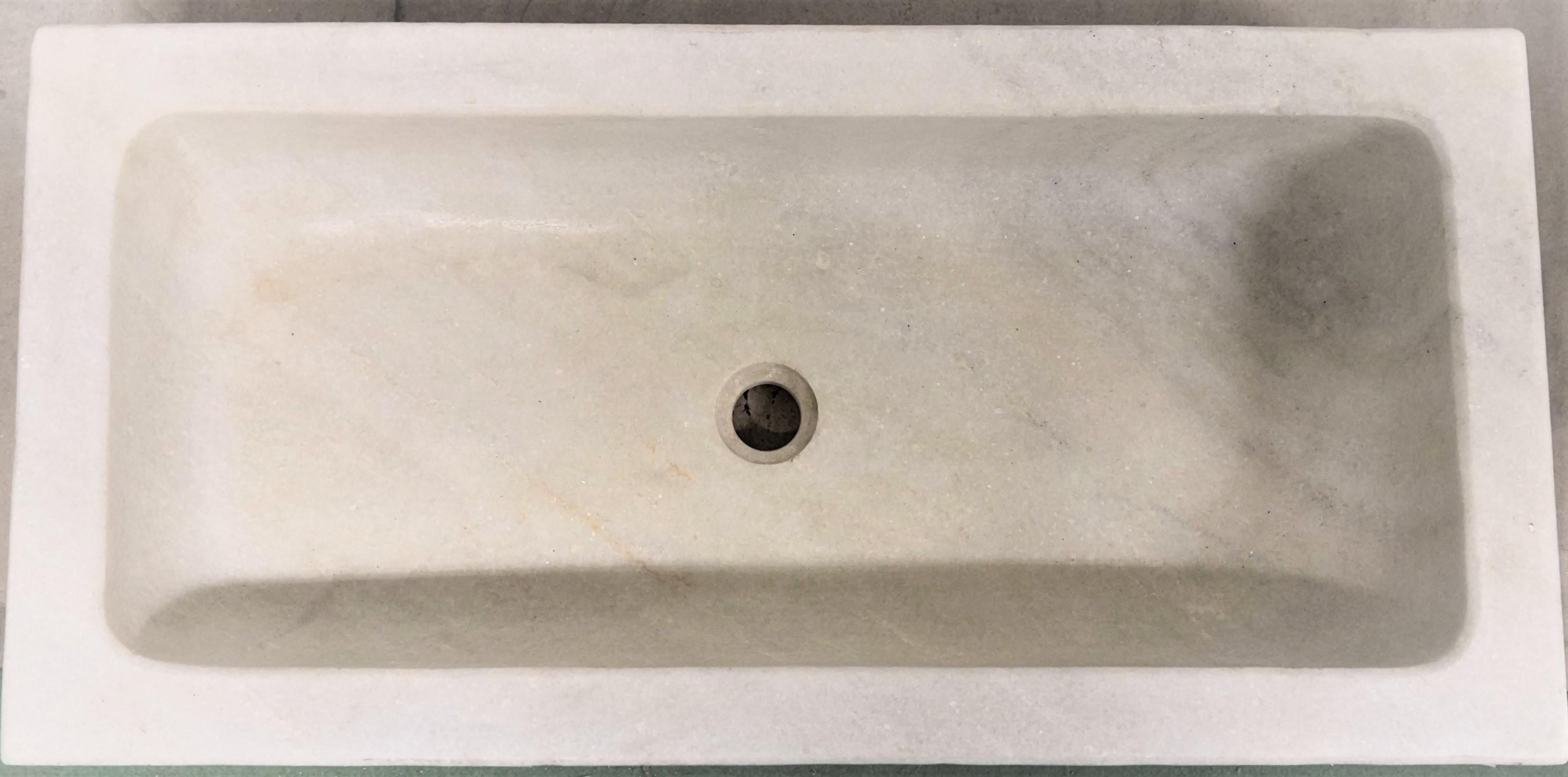 A simple natural design ideal for a kitchen or bathroom for old and new buildings,
superb warm veined character stone cut from one piece of Carrara marble.
Sink manufactured in Carrara marble, custom sizing available.
 