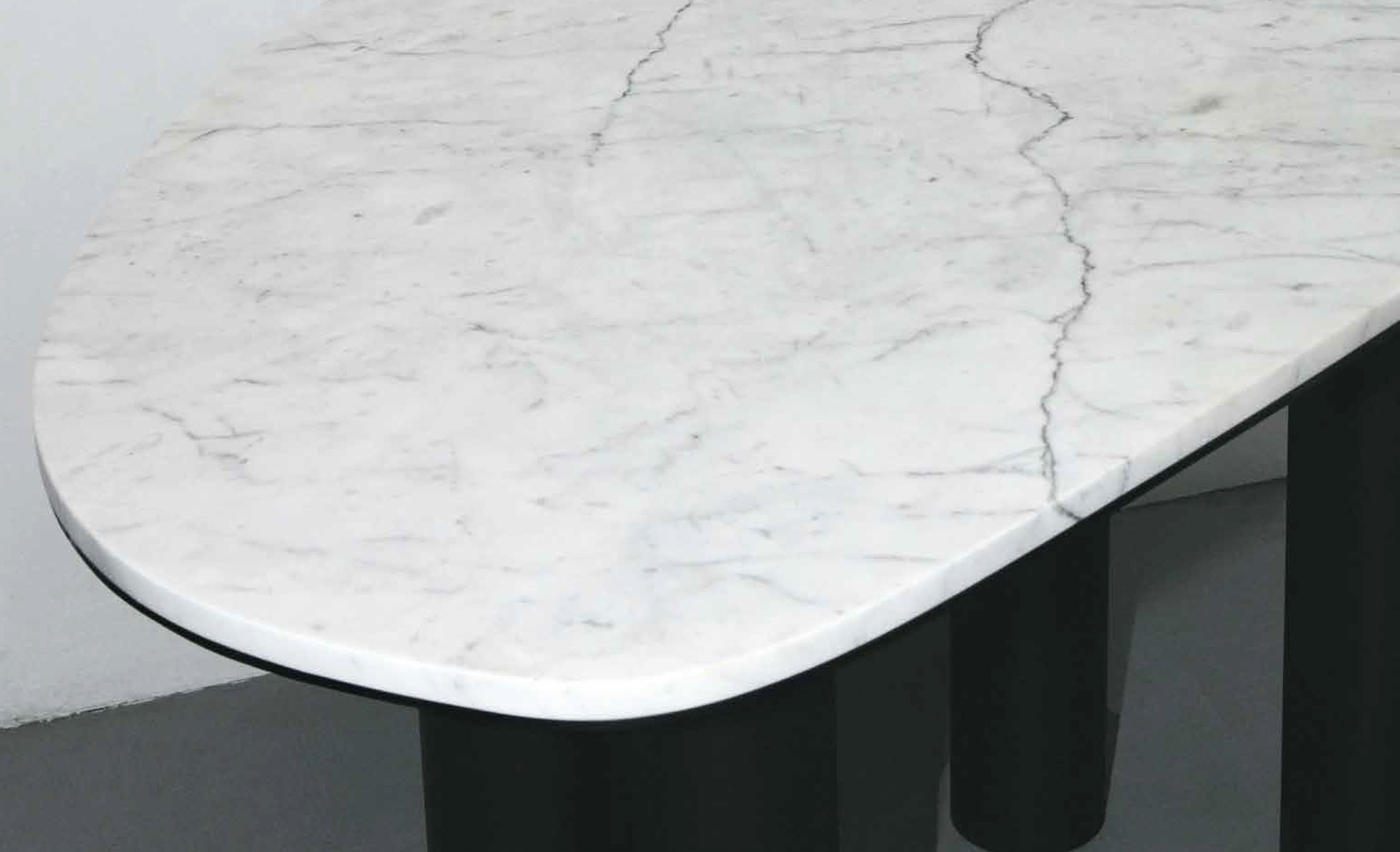 Celebrating nature's inherent beauty, the Oni Desk embraces the irregular shape of a found Carrara marble slab. This desk's innovative design is informed by the unique constraints of the stone, resulting in a mesmerizing and one-of-a-kind form. The