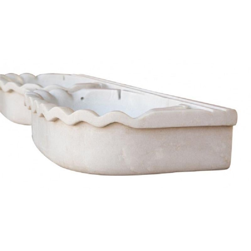 This timeless beautiful Italian classical sink is cut from one single block of white Carrara marble, the design has not changed since Greek and Roman times, it carries superb artistic merit easily fitting in with old and new buildings. It also makes