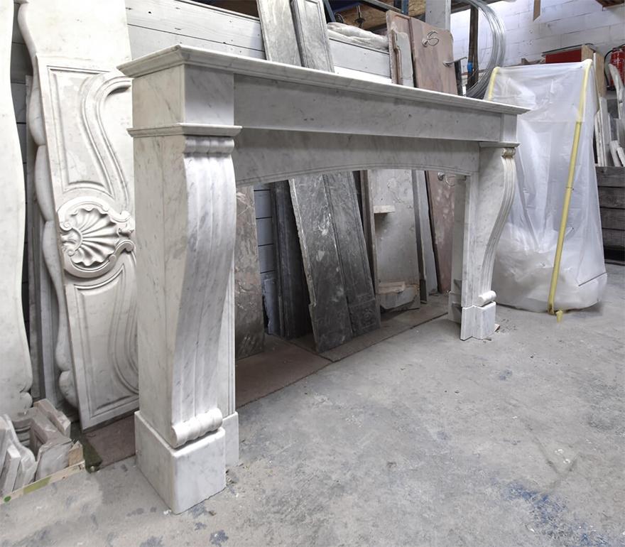Fireplace made out of carrara marble. To place in front of a chimney.
In a very good state.