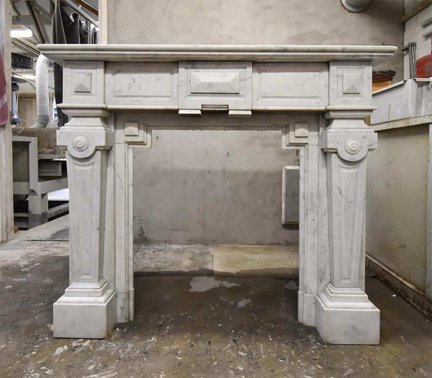Carrara marble fireplace mantel from the 19th Century to
place around the chimney.