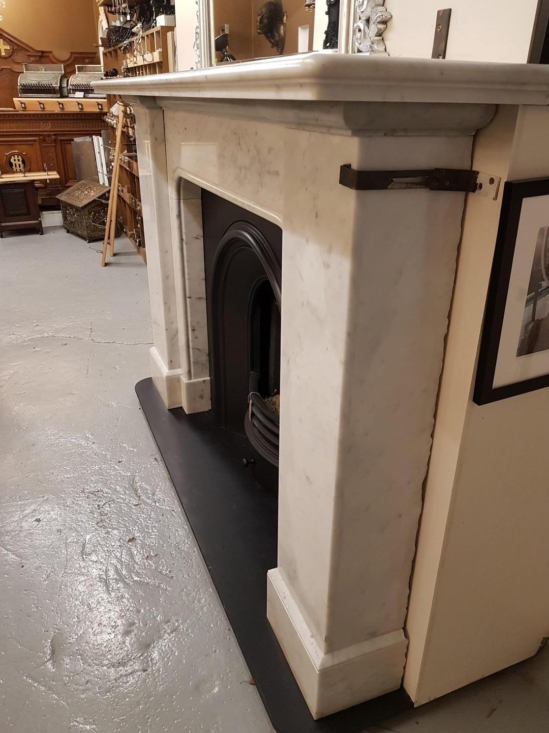 Fully restored and polished Carrara marble fireplace mantel

Insert shown for display purposes only, available separately

Mantel shelf: 76 3/4”

Mantel height: 48 1/2”

Opening width: 39 1/2”

Opening height: 37 1/4”.