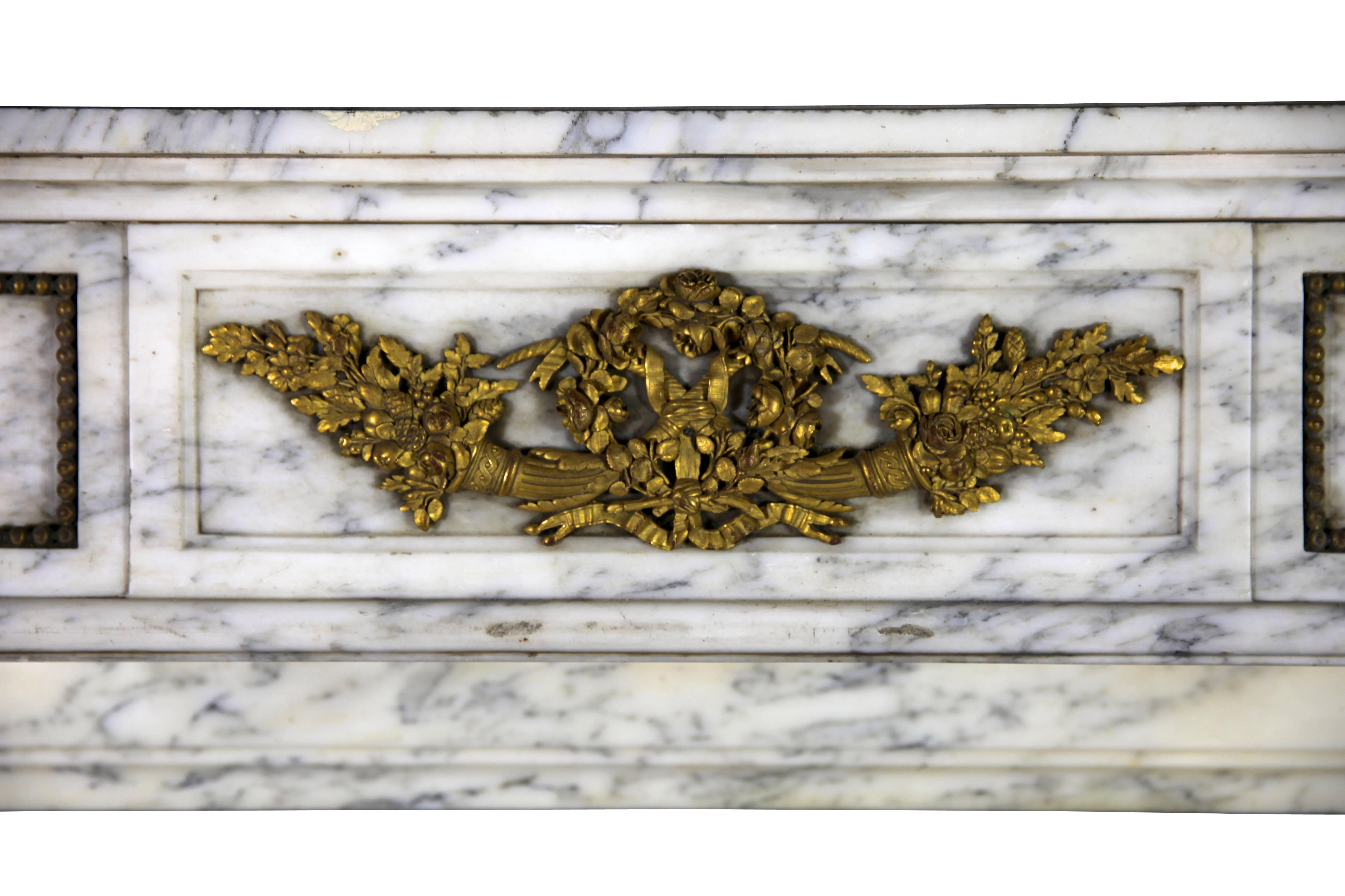 Carved Carrara Marble French Antique Fireplace Surround in the Style of Louis XVI For Sale