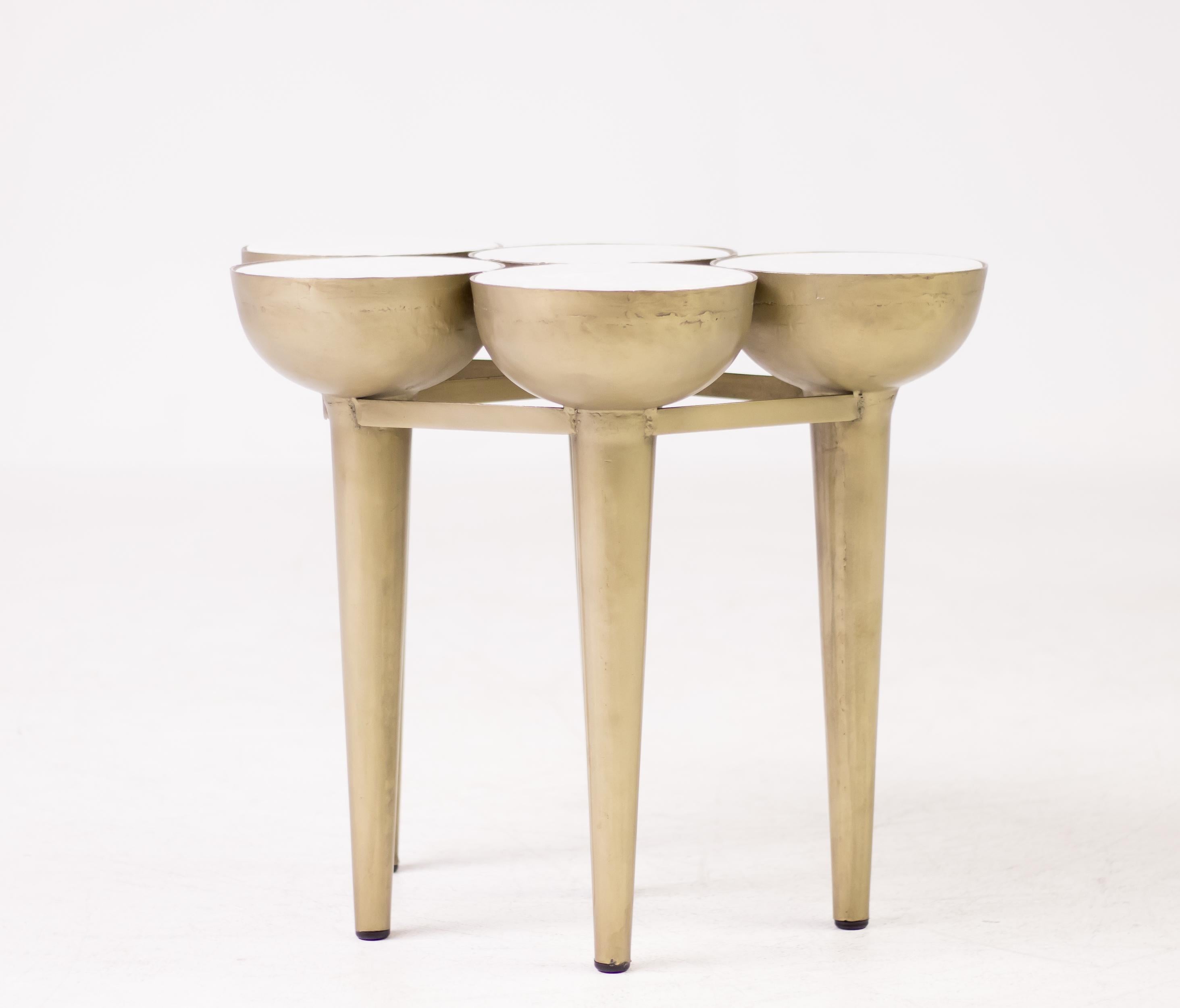 Unique side table composed of five torch shaped gold lacquered metal elements inserted with round Carrara marble tops.
Great conversation piece!