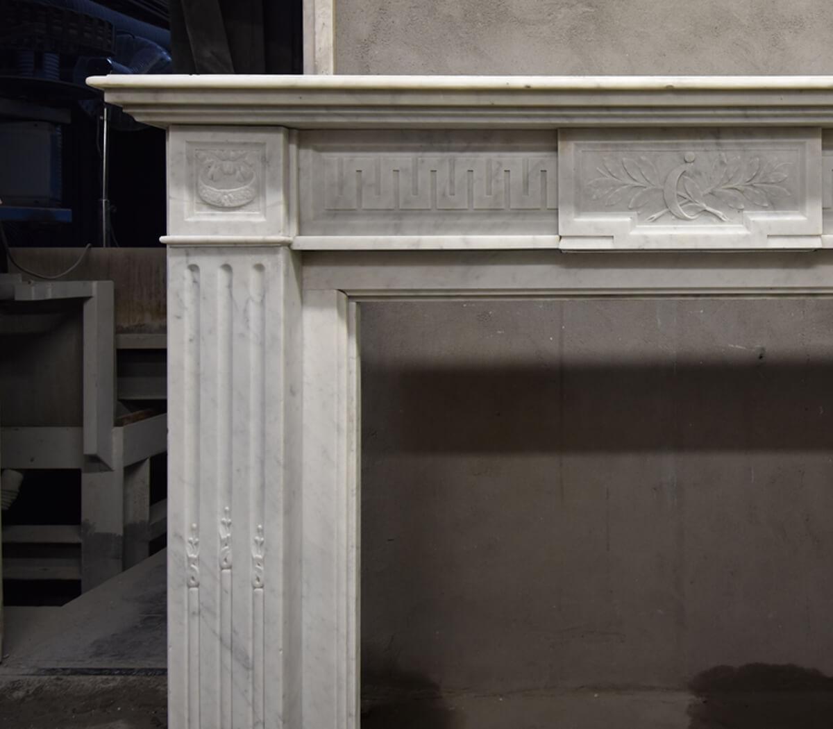 Nice Carrara marble Louis XVI fireplace mantel to place
around the chimney.