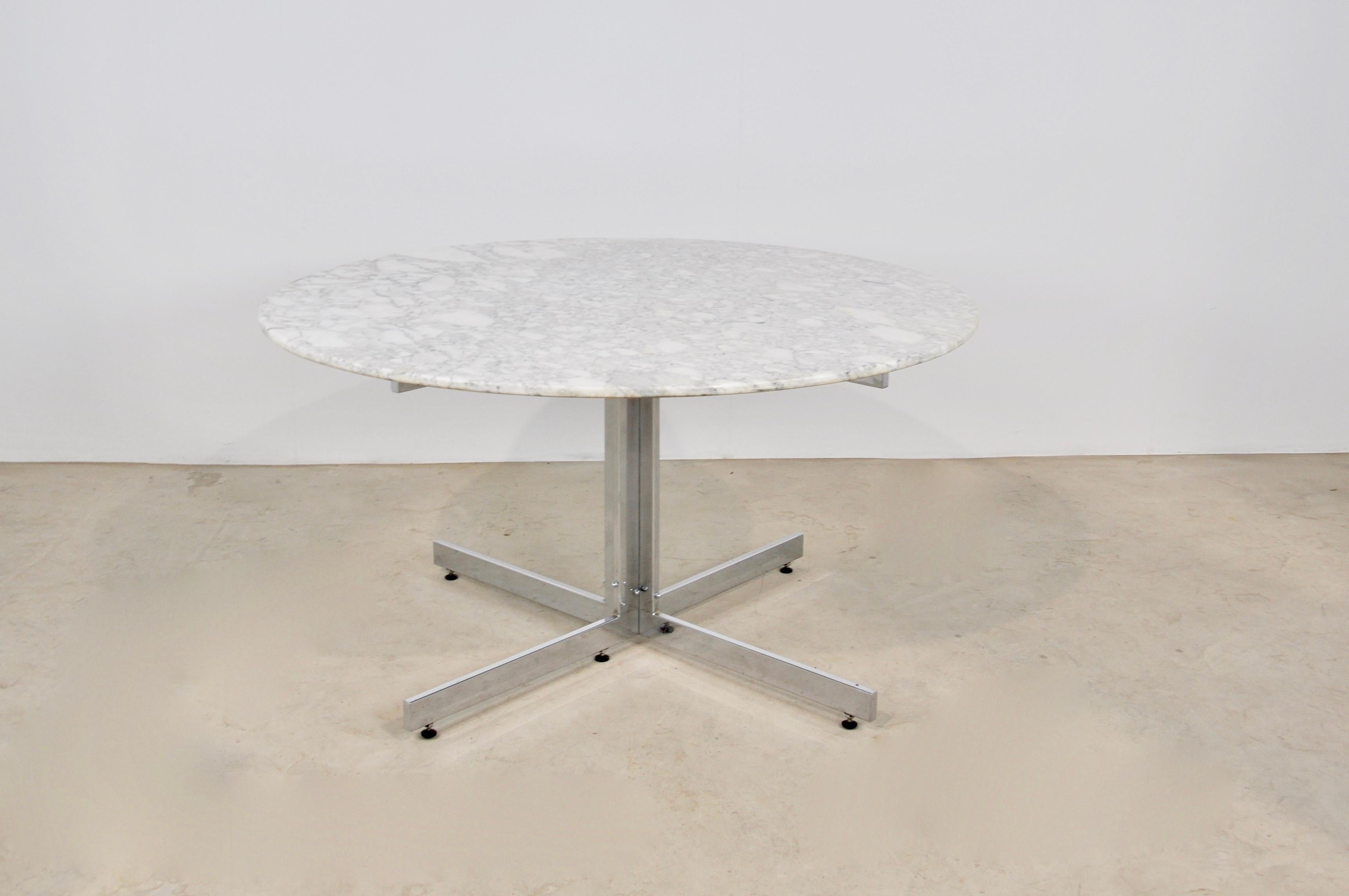 Carrara marble table, chromed metal base. Wear due to time and age of the table.