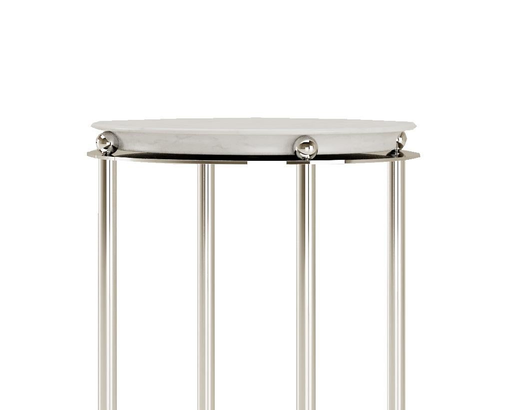 Carrara Marble Saturno Side Table by Andrea Bonini
Limited Edition
Dimensions: Ø 35 x H 56 cm.
Materials: Carrara Marble and natural steel.

Limited series, numbered and signed pieces. Custom size or finish on request.  Also available in a natural