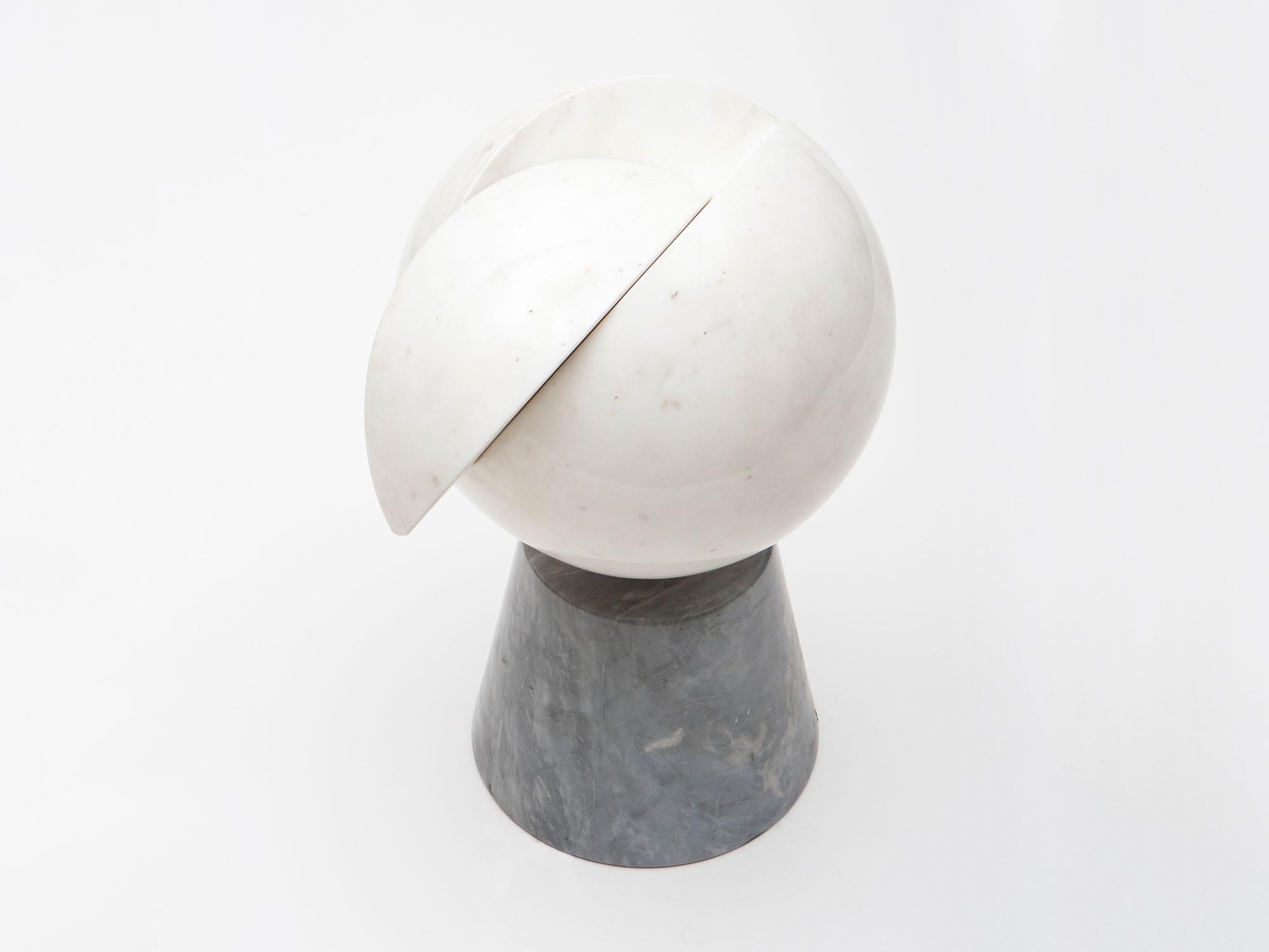 Carrara marble sculpture by Israeli-American artist Hanna Eshel (b. 1926). Hand carved in Carrara, Italy. Eshel is a multi-disciplinary artist best known for her work in carved marble, a skill she honed from 1972-1978 while living and practicing in