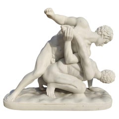 Sculpture en marbre de Carrare représentant deux lutteurs - XXe siècle