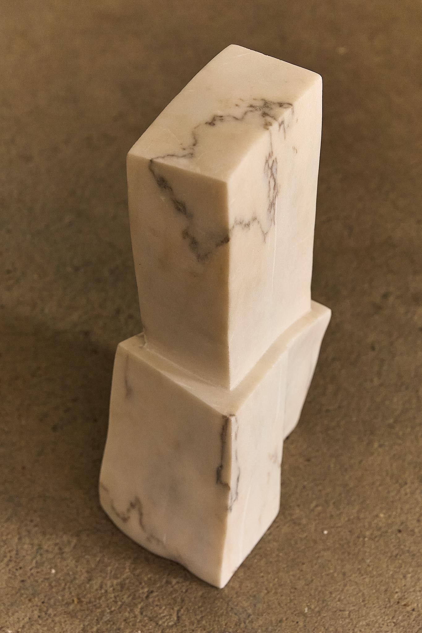 A striking abstract sculpture from the 1970s, expertly carved from solid Italian Carrara marble.