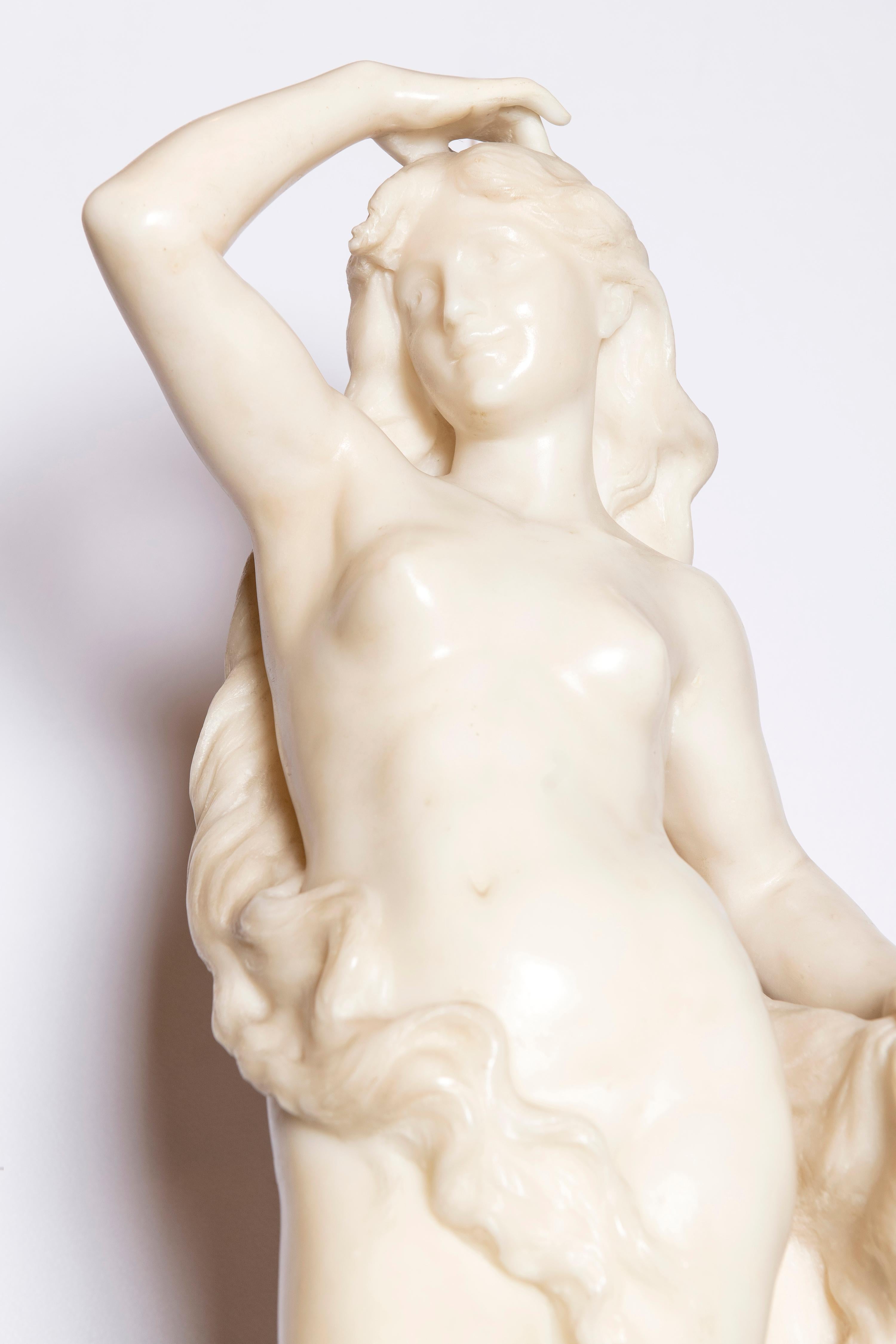 Carrara marble sculpture signed Luca Madrassi, Paris, circa 1890.
Art Nouveau period.