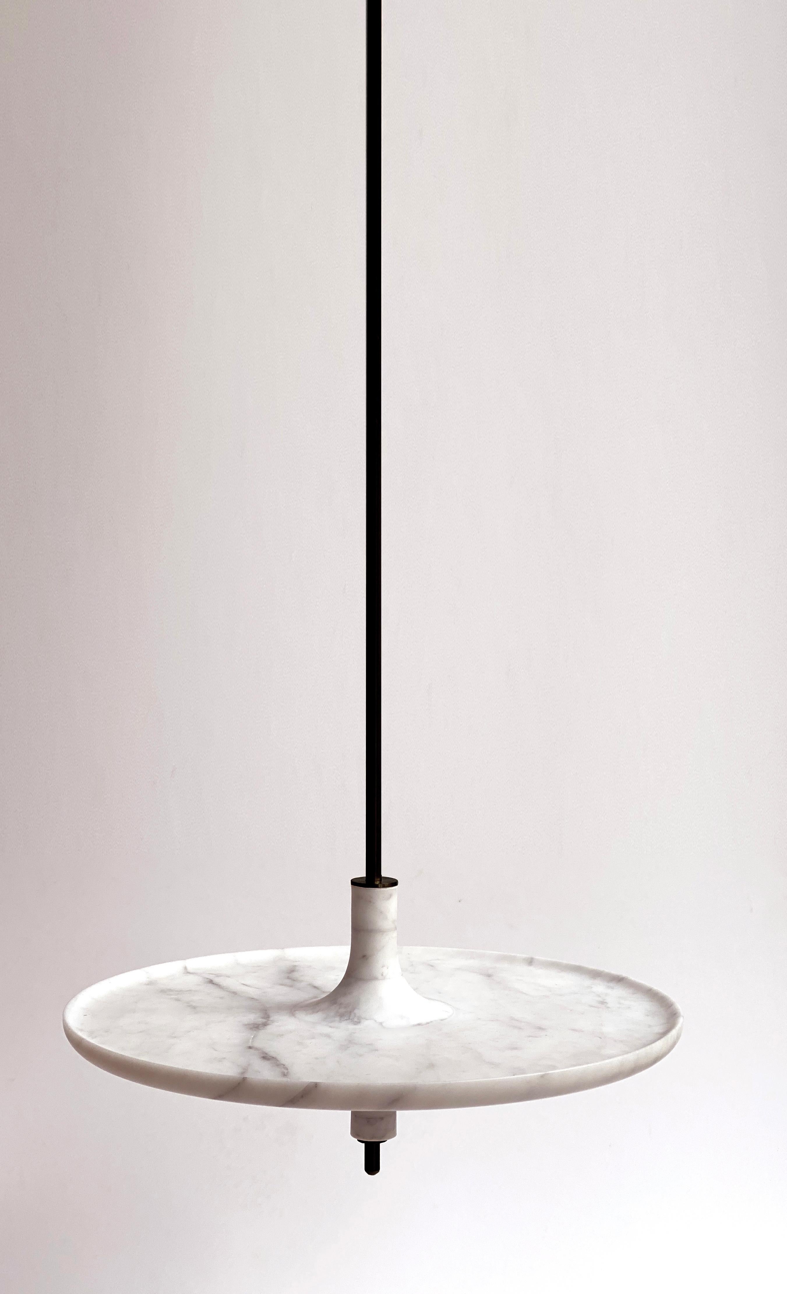 Carrara White Marble and Black Metal 38 Hanging Table by Mademoiselle Jo
Dimensions: Ø 38 x H 150 cm.
Materials: Carrara white marble and black metal.

Available in four wood colors, three marble options, two bar versions and several diameters.