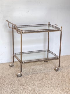 Bar cart with brass and glass, featuring double shelves, "Kensington," 1970s