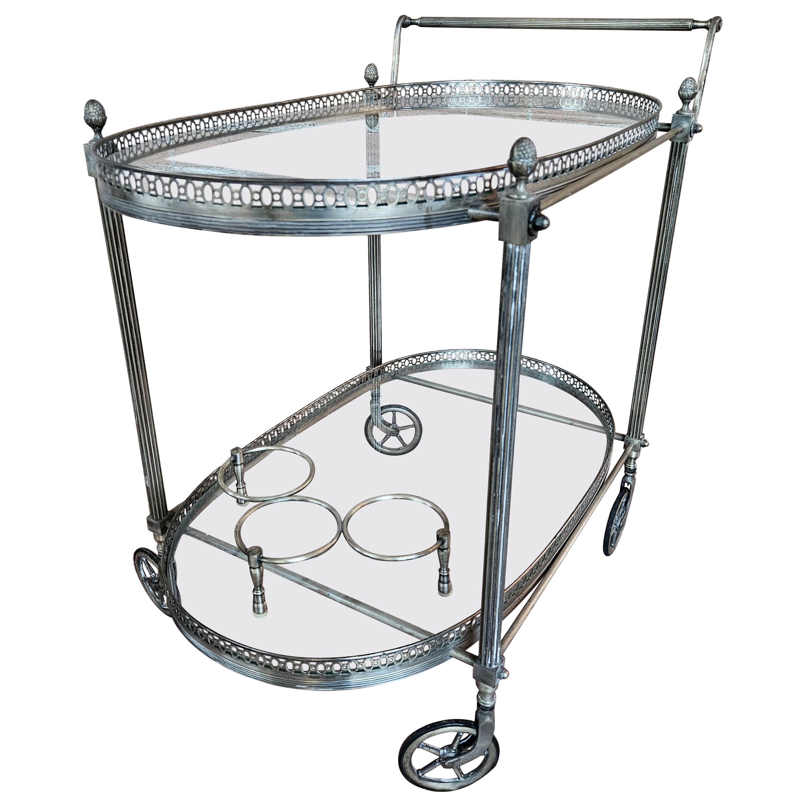 1970s hall bar cart made of machined brass and glass For Sale