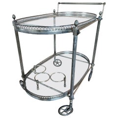 Carrello bar da sala anni '70 in ottone lavorato e vetro
