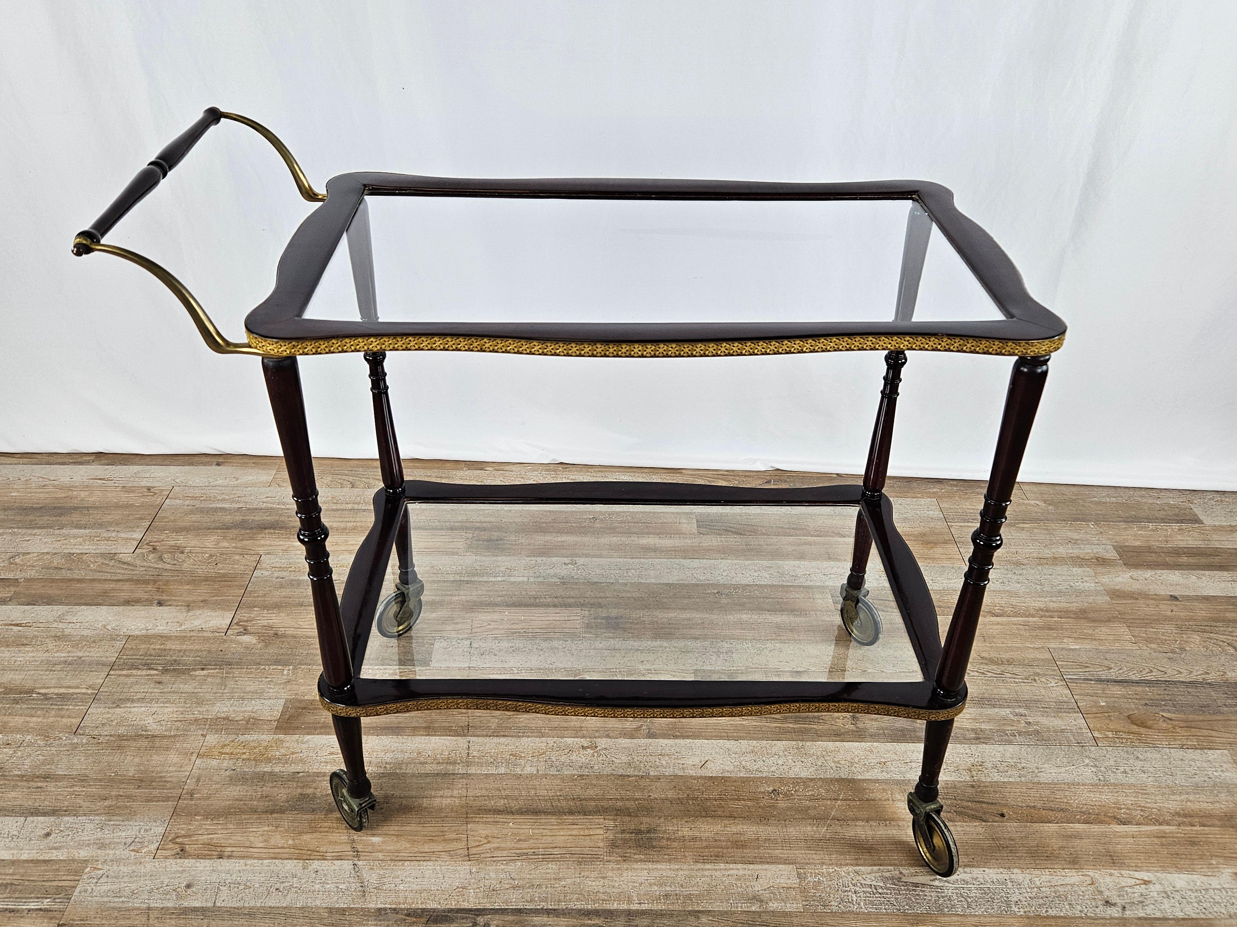 Mid-Century Modern Rosewood bar cart with brass profiles, 20th century For Sale