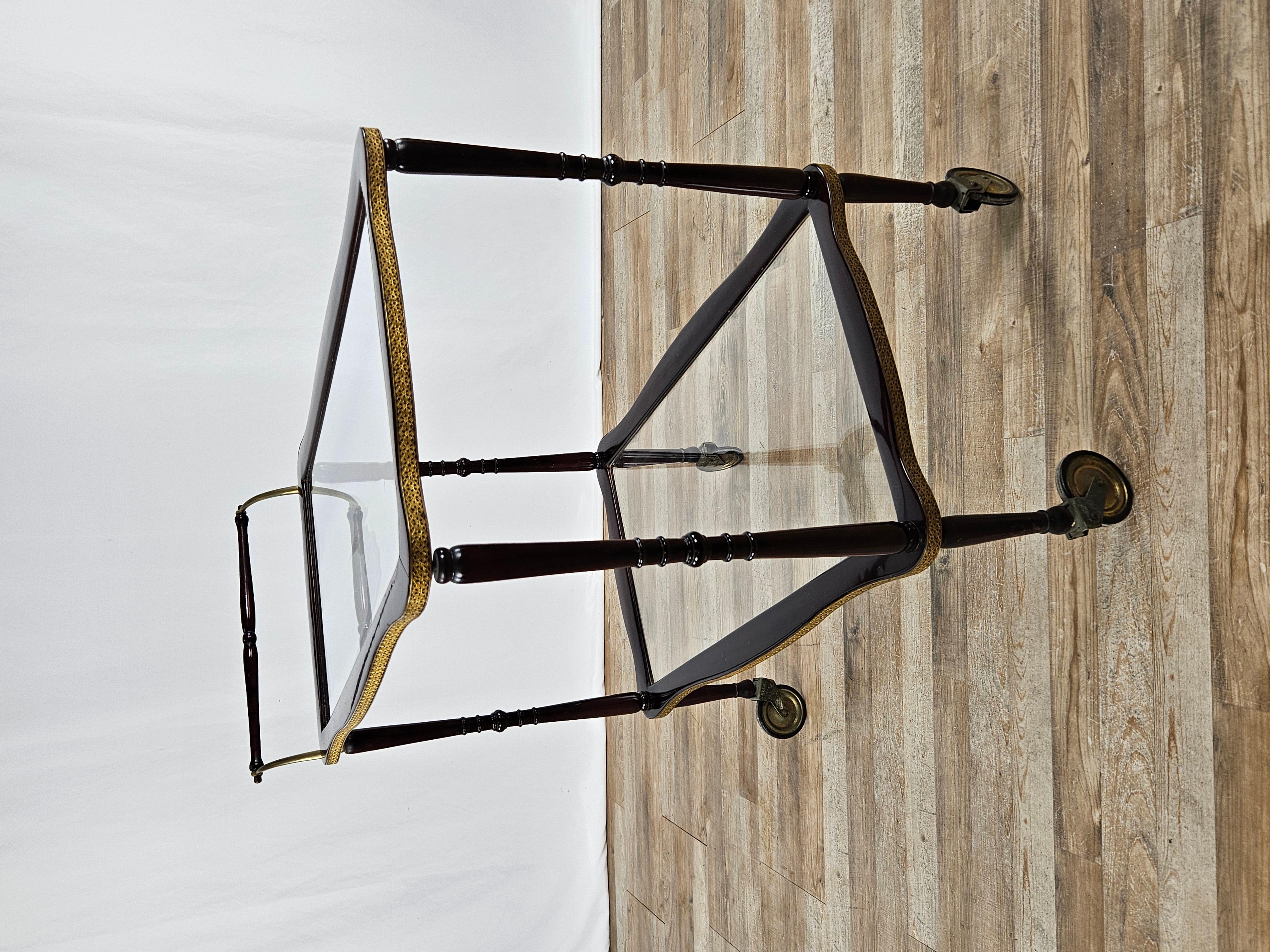 Italian Rosewood bar cart with brass profiles, 20th century For Sale