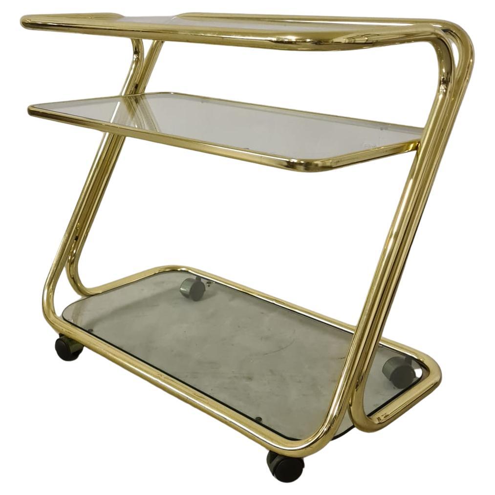 Carrello morex metallo dorato e vetro anni 80' in vendita