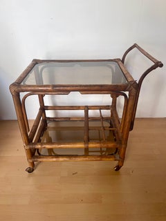 Italian food cart made of Bengal wood and smoked glass 1970s
