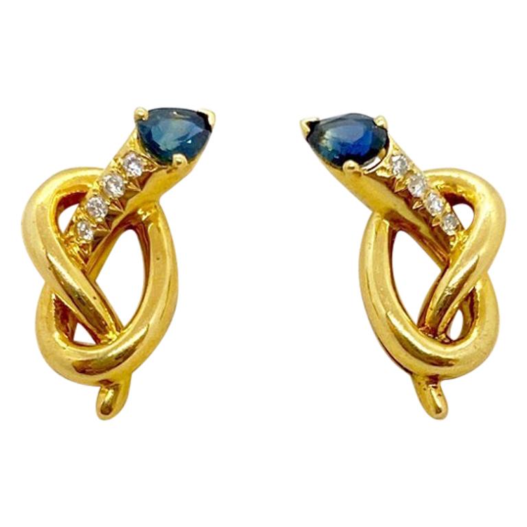 Carrera Y Carrera 18 Karat Gold Knot Earrings with Diamonds and Blue Sapphires For Sale