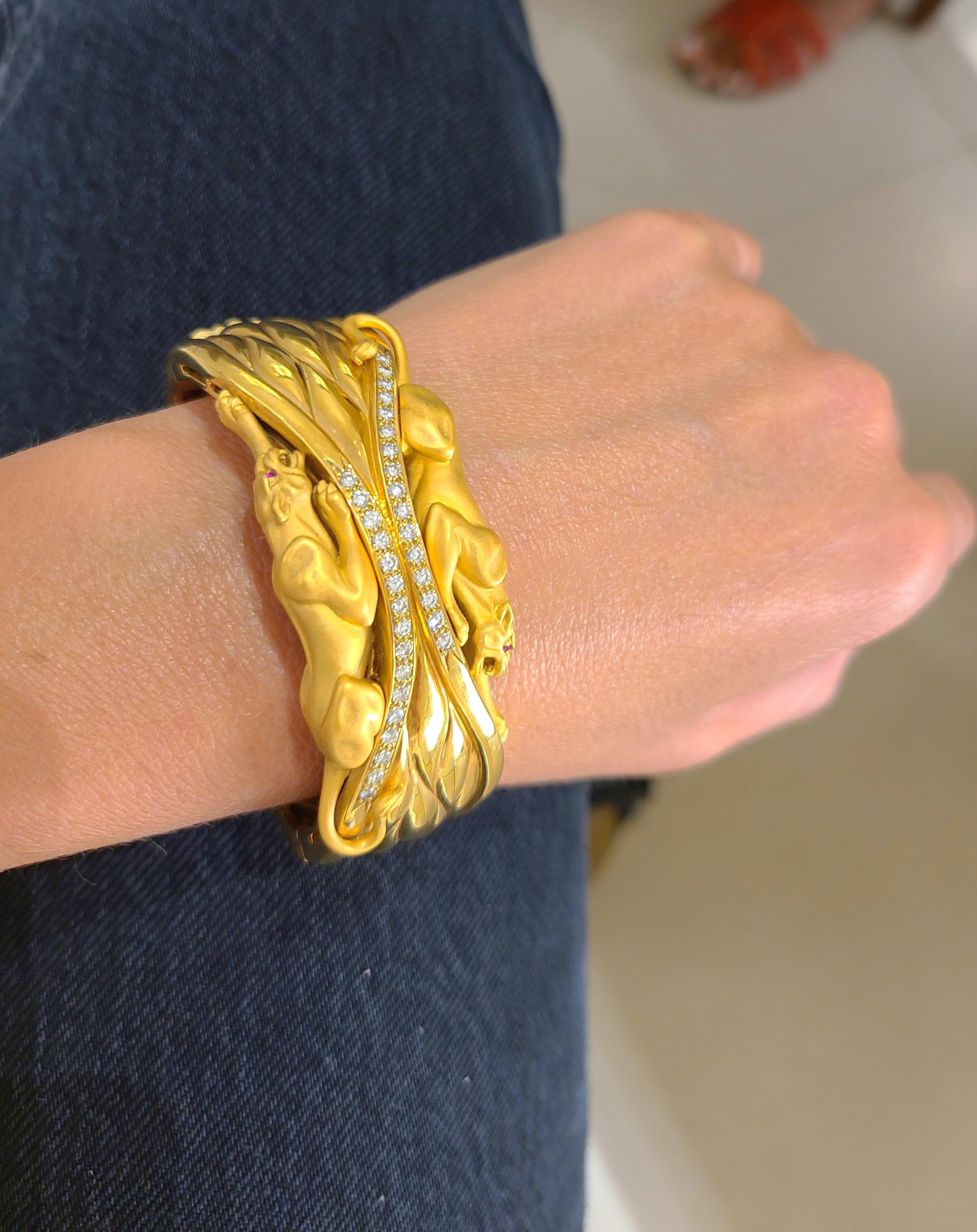 Carrera Y Carrera has built its famous name on figurative designs, an obsession with surface finishes, and a compelling way of seeing beauty in art and nature. This 18 karat yellow gold cuff bracelet is a perfect example of Carrera's iconic