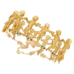 Carrera y Carrera Bracelet à motif chérubin en or 18 carats, diamants 0,4 carat, émeraudes et rubis