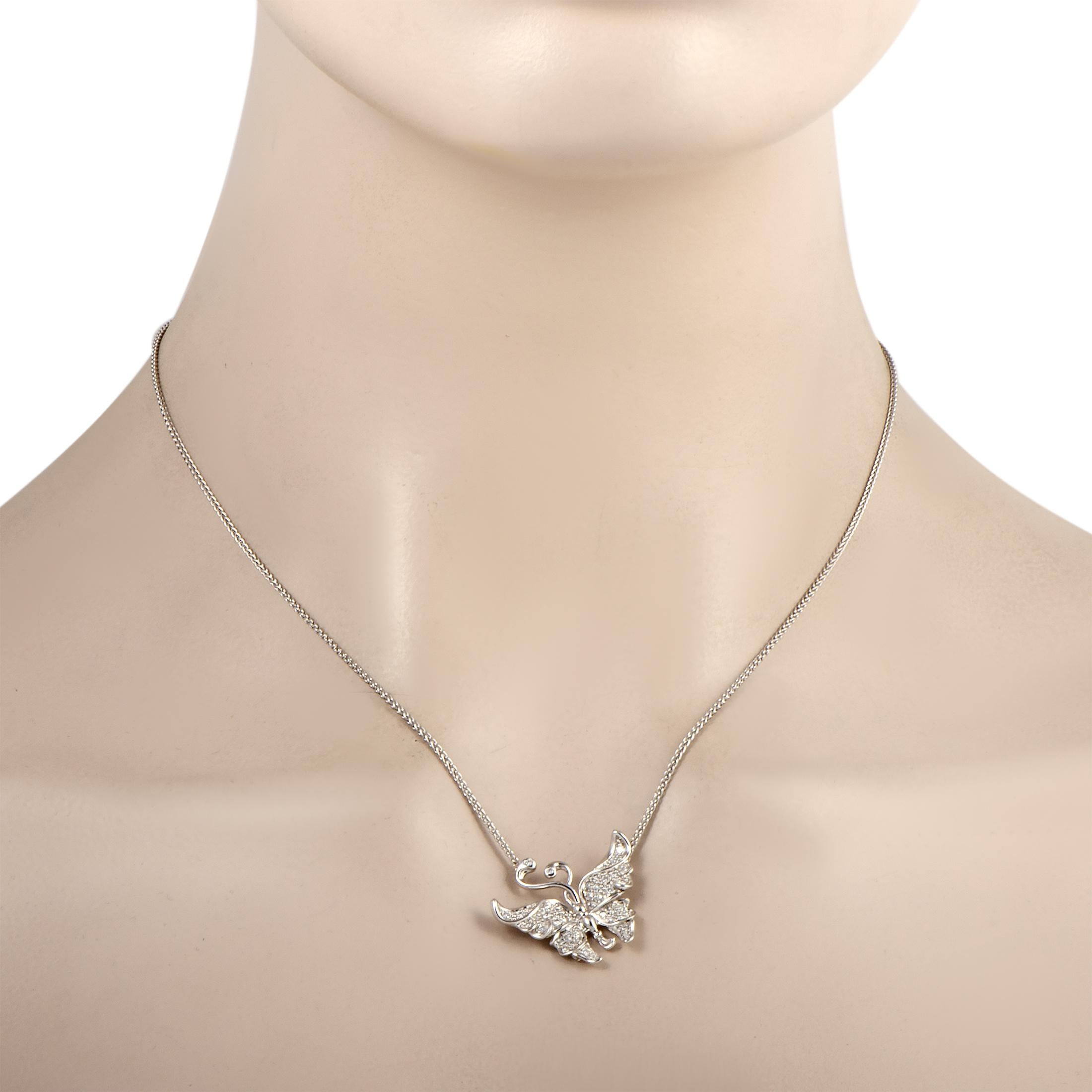 This Carrera y Carrera necklace is made out of 18K white gold and diamonds that amount to 0.37 carats. The necklace weighs 7.5 grams and is presented with a 17” chain, boasting a butterfly pendant that measures 0.50” in length and 1” in width.
 
