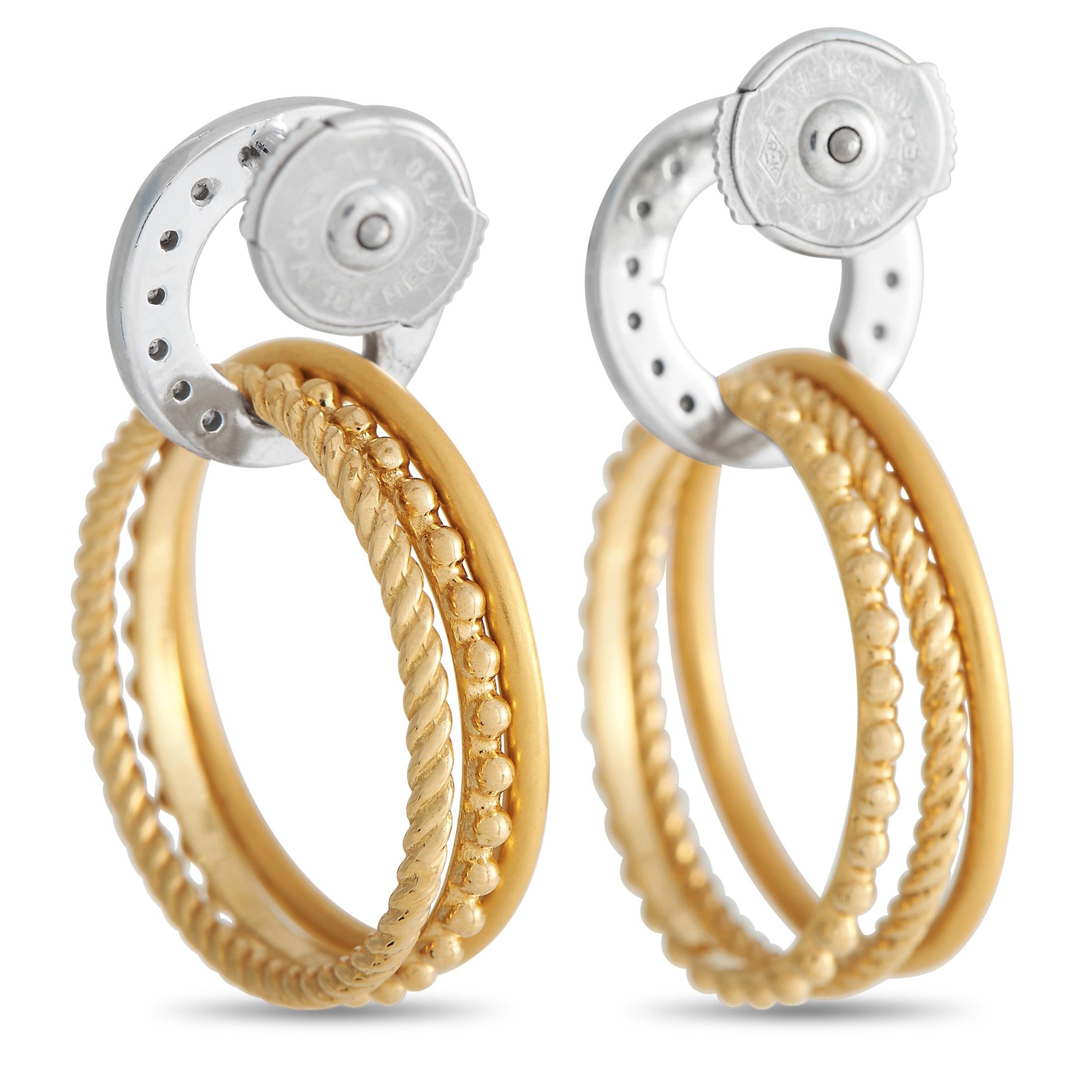 Stunning craftsmanship is boldly on display in these Carrera y Carrera earrings. On this elegant accessory, delicate 18K Yellow Gold hoops dangle from a silver-toned circular motif that is accented by 0.30 carats of sparkling round-cut diamonds.