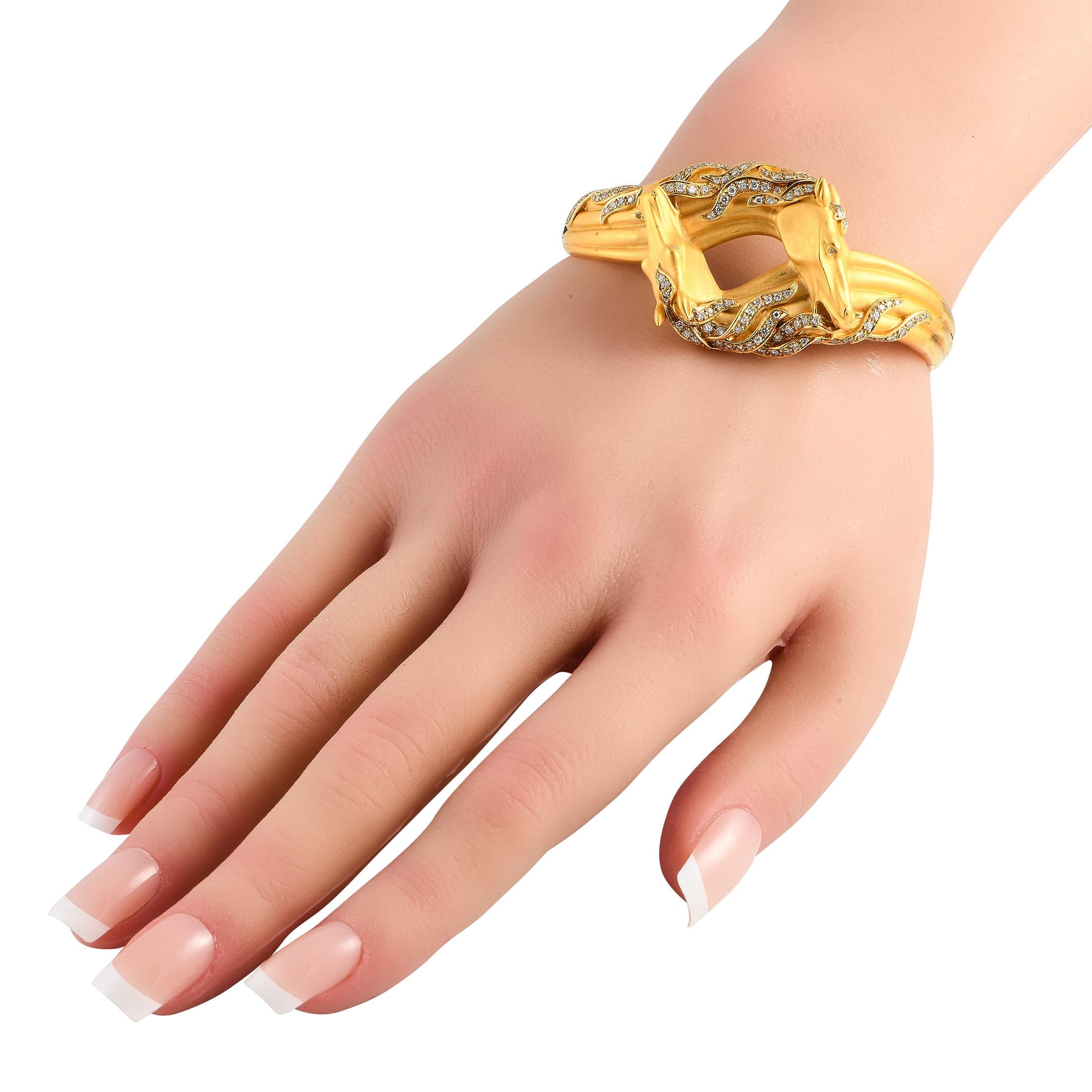 From Spanish jewelry company Carrera y Carrera, here is a finely crafted bangle bracelet in solid yellow gold. The piece reflects the brand's sculptural artistry and passion for gold, backed by over a century of expertise. This rigid bracelet