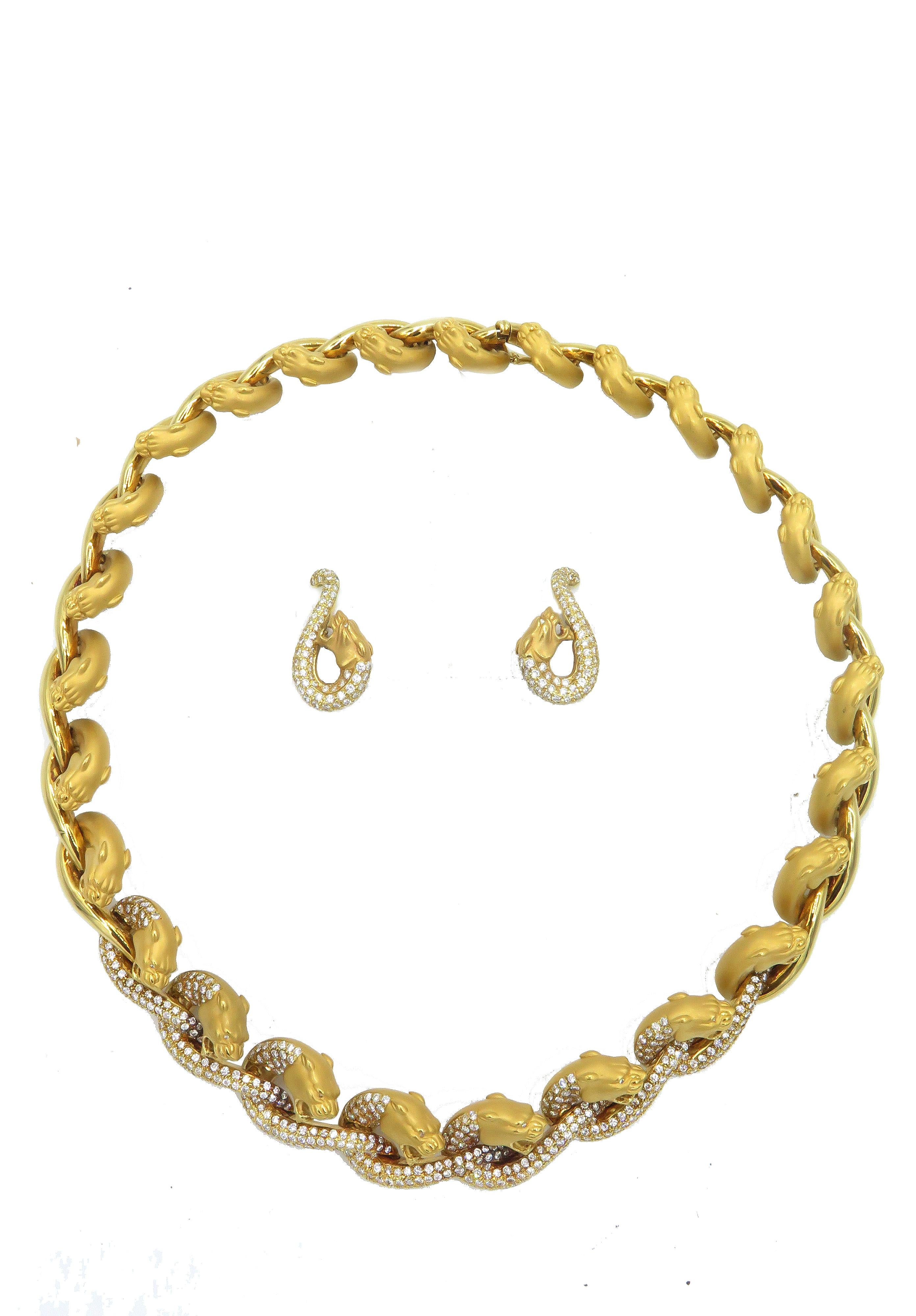 If you love the distinct golden glow of Spanish gold, you will lust after this magnificent Cerrera y Cerrera necklace and earring set. Fashioned in the Carrera y Carrera iconic tiger design, 18k yellow gold and precious diamonds come together In