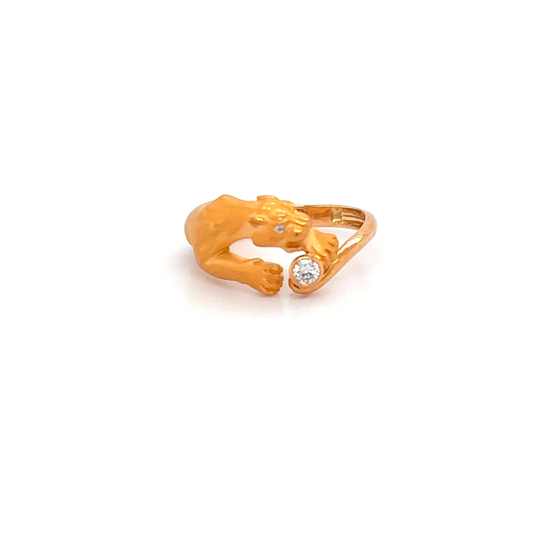 Beautiful ring crafted in 18k yellow gold by famed designer Carrera y Carrera. The elegant design depicts a Panther that wraps around your finger leading up to one bezel set earth mined natural diamond. 
Carrera y Carrera showcases different polish